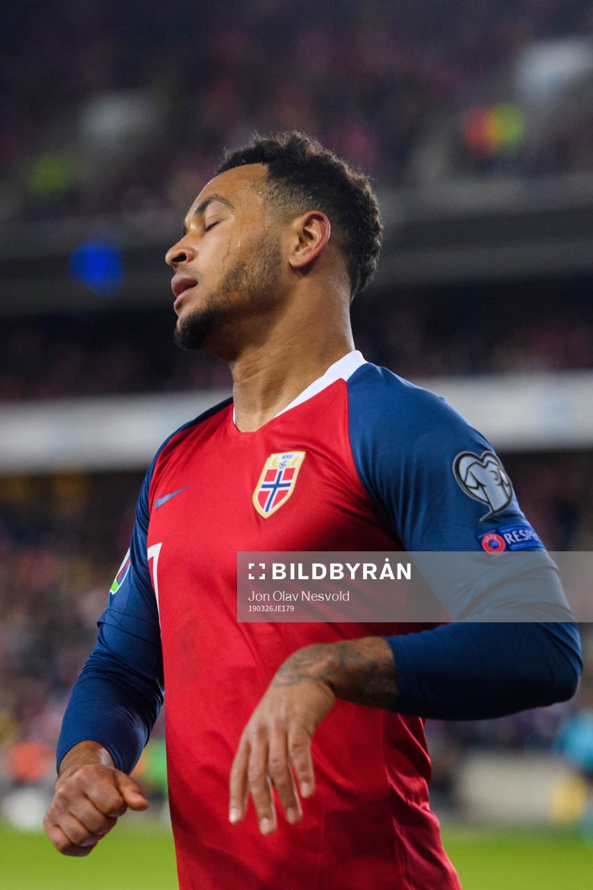 Joshua King of Norway looks dejected
