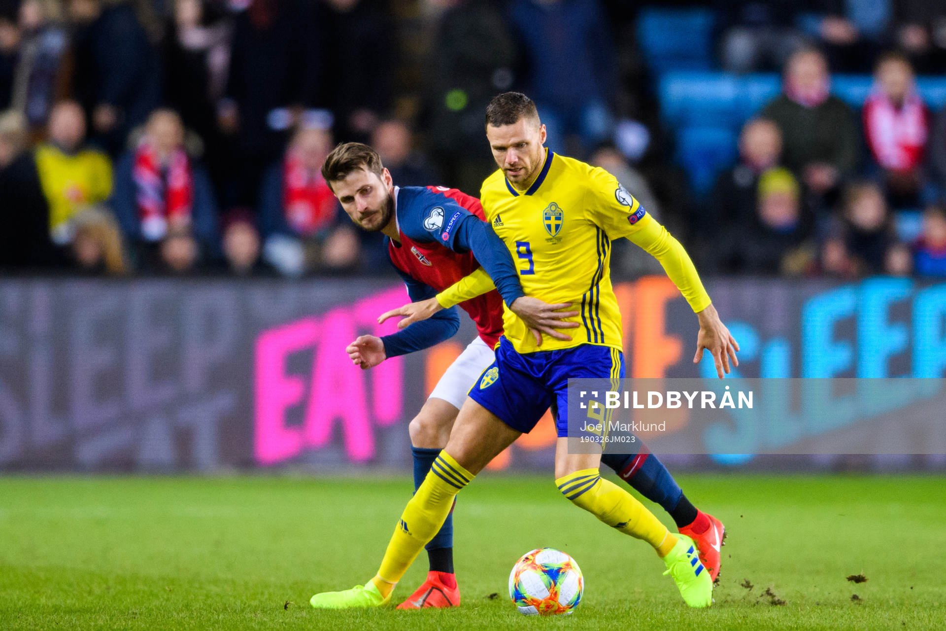 Håvard Nordtveit of Norway in action with Marcus Berg of