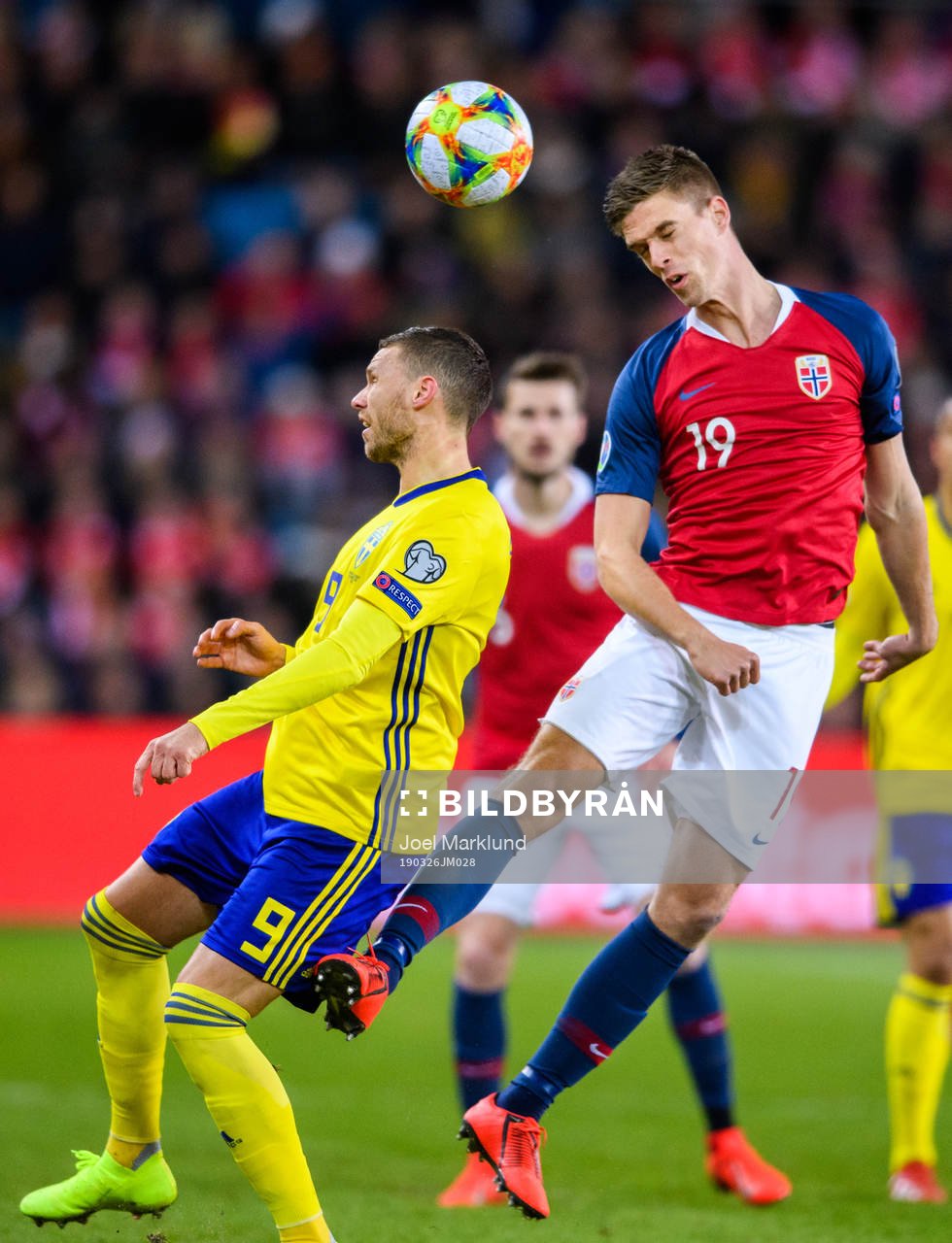 Marcus Berg of Sweden and Markus Henriksen of Norway