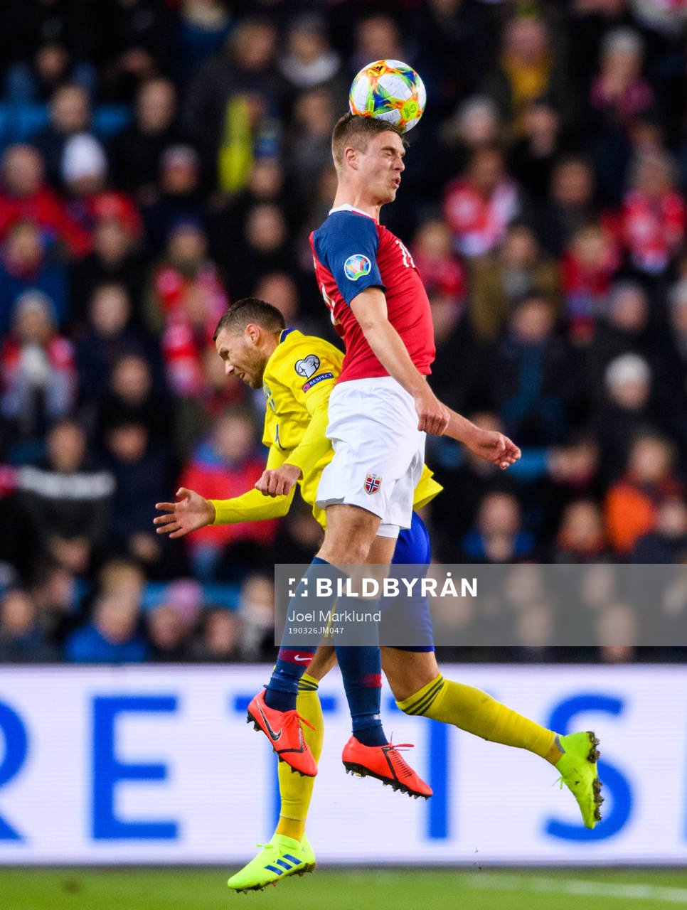 Marcus Berg of Sweden and Markus Henriksen of Norway