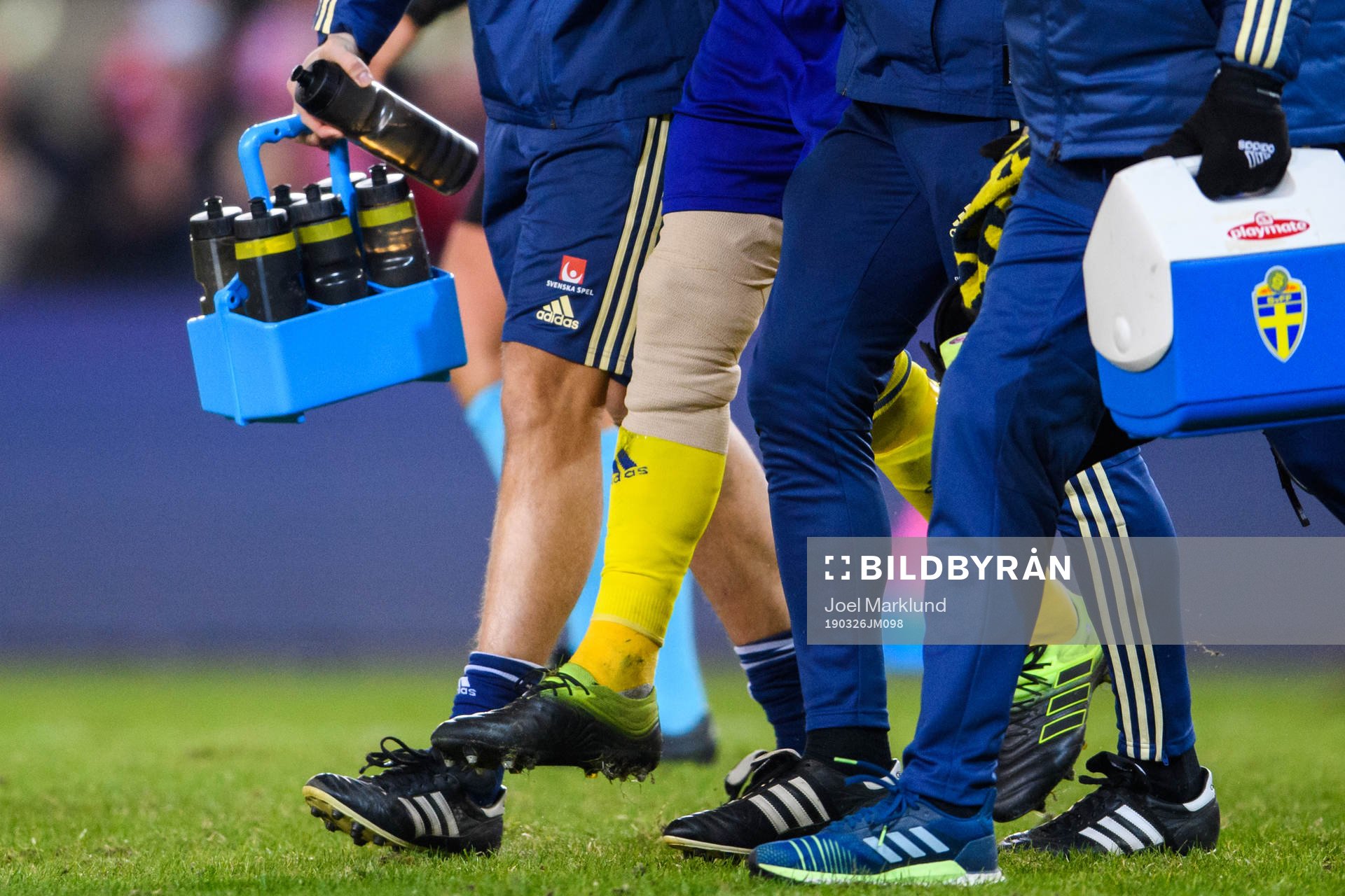 Albin Ekdal of Sweden leaves the pitch with an injury