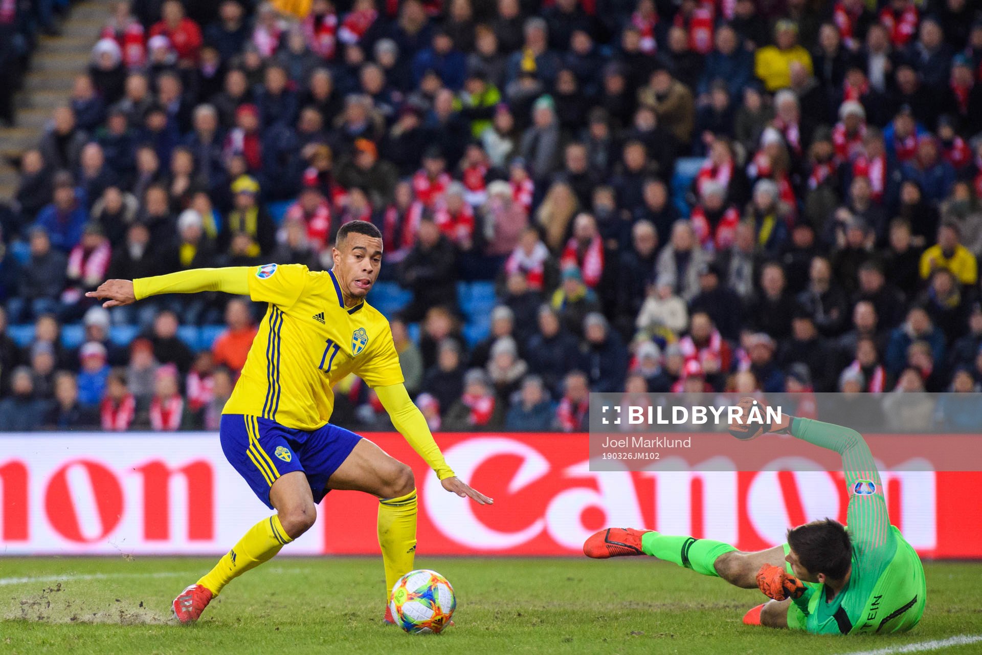 Robin Quaison of Sweden in action against goalkeeper Rune