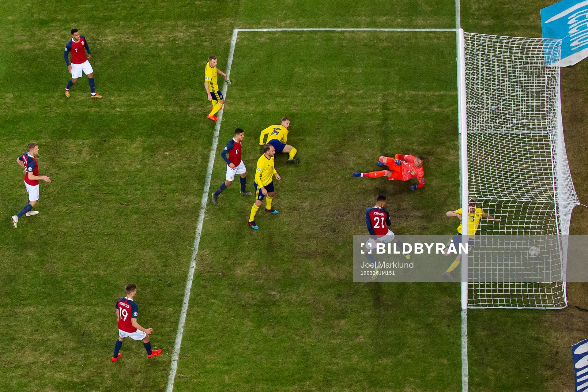 Bjørn Maars Johnsen of Norway scores 1-0 behind goalkeeper
