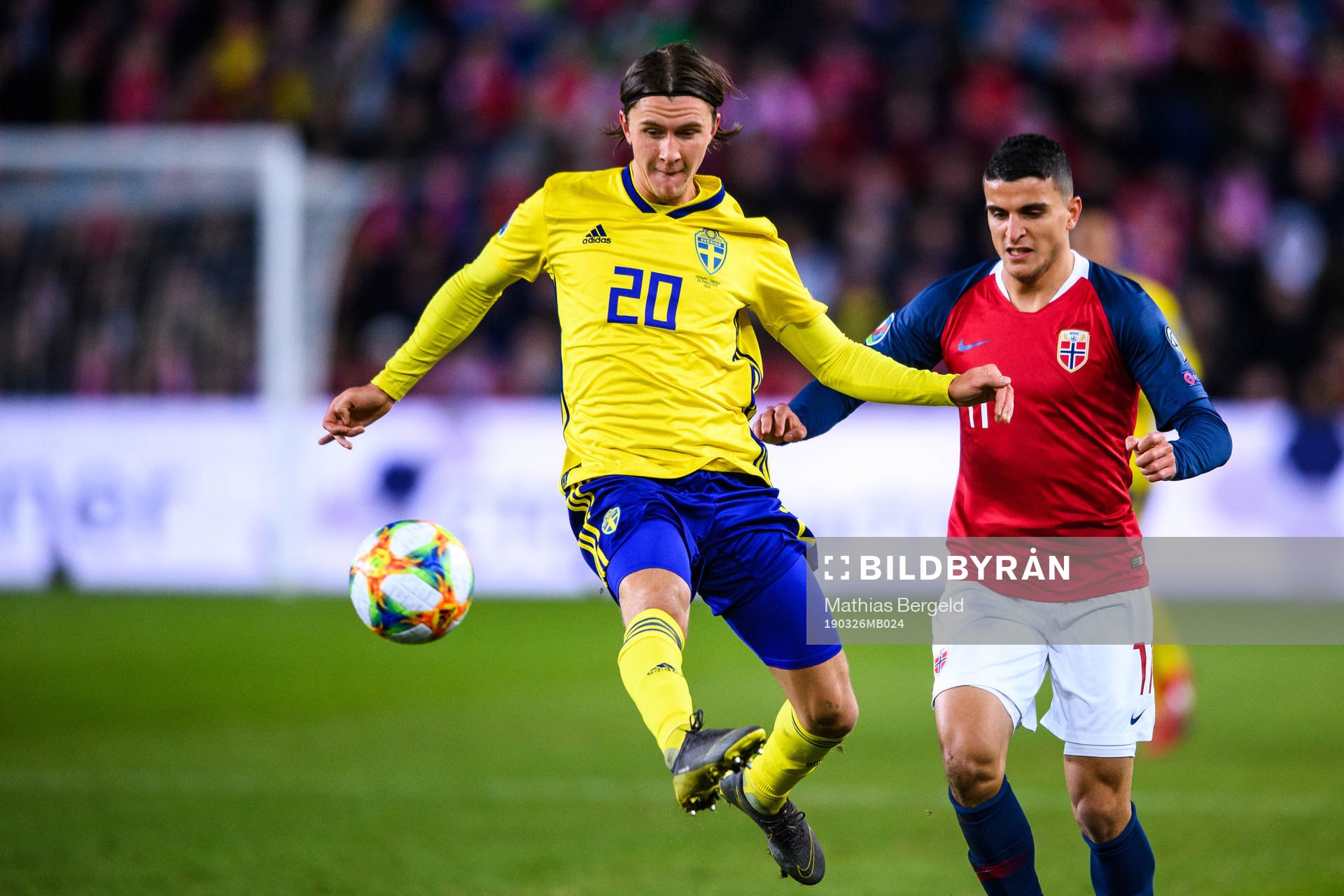 Kristoffer Olsson of Sweden and Mohamed Elyounoussi of