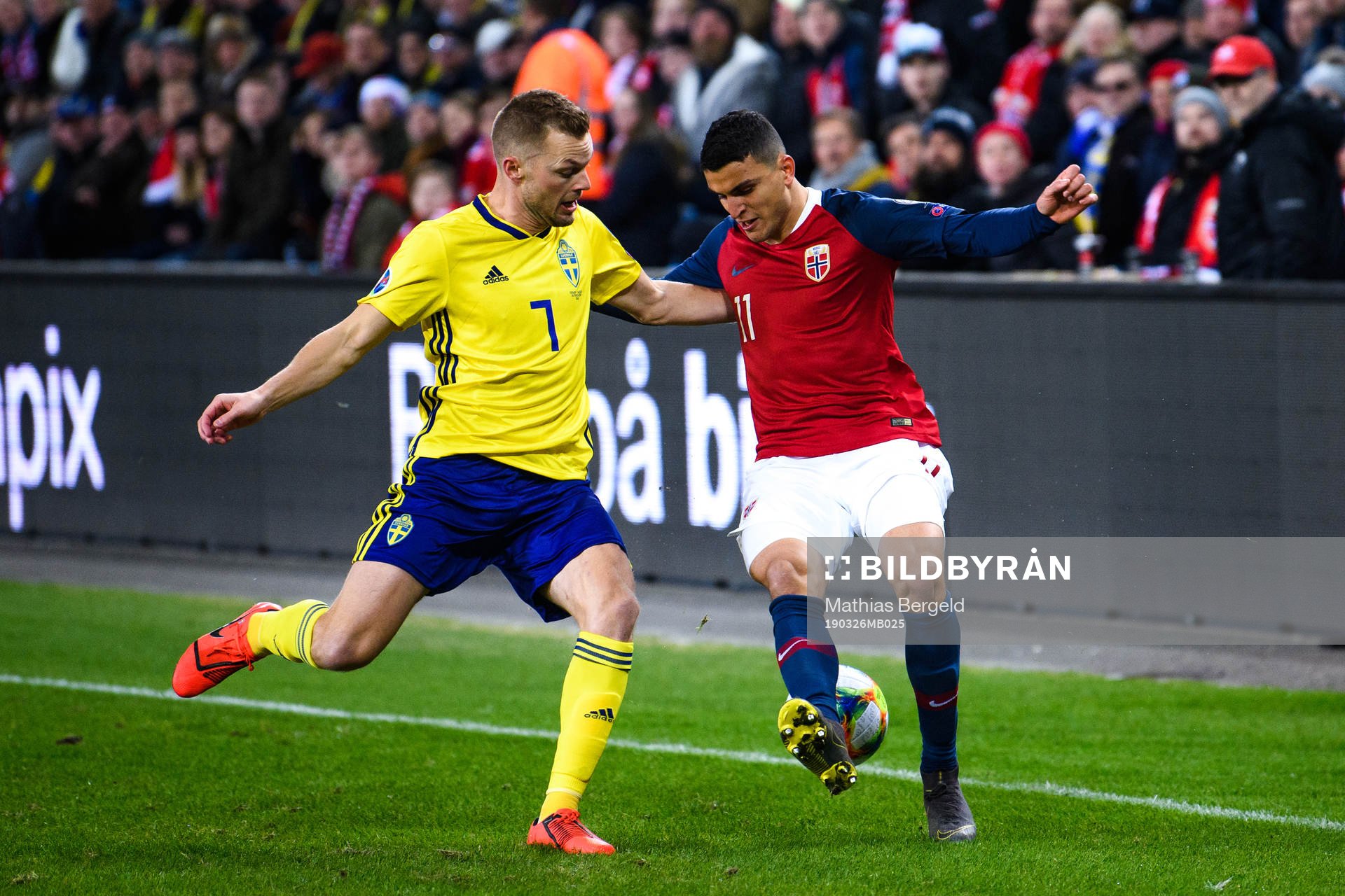 Sebastian Larsson of Sweden and Mohamed Elyounoussi of