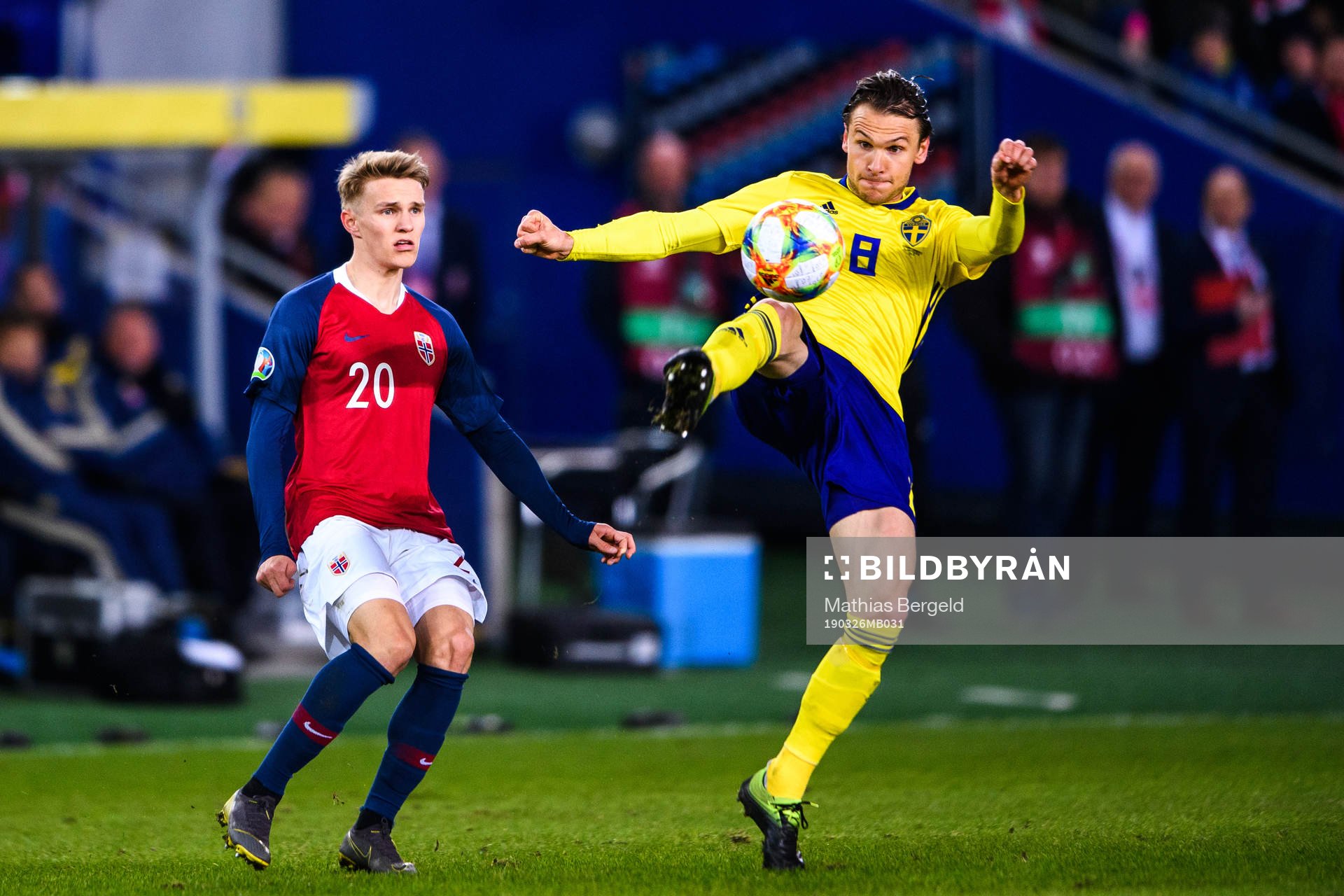Martin Ødegaard of Norway and Albin Ekdal of Sweden