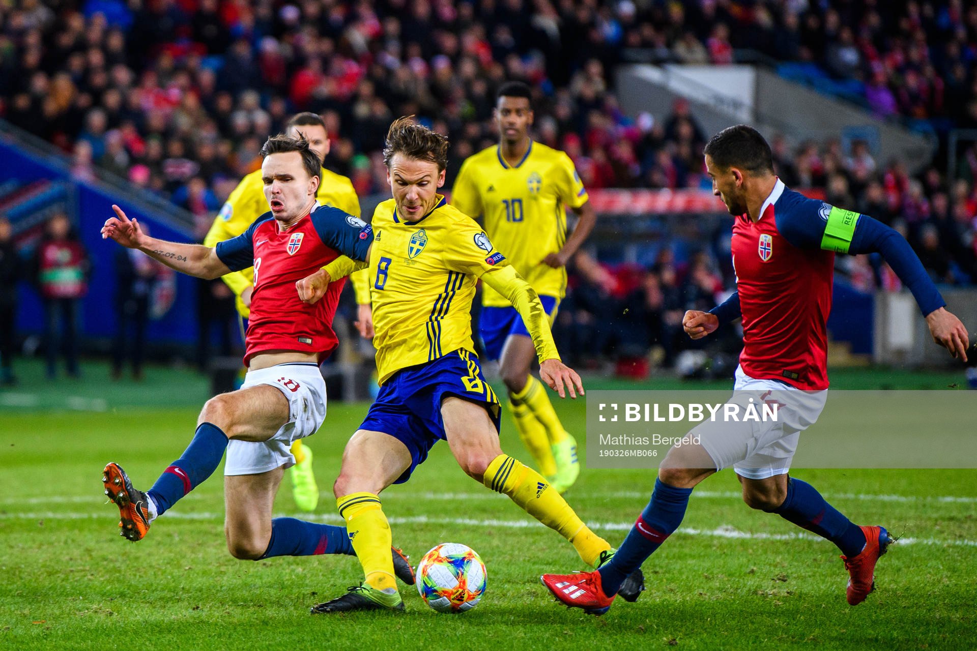 Albin Ekdal of Sweden against Stefan Johansen and Omar