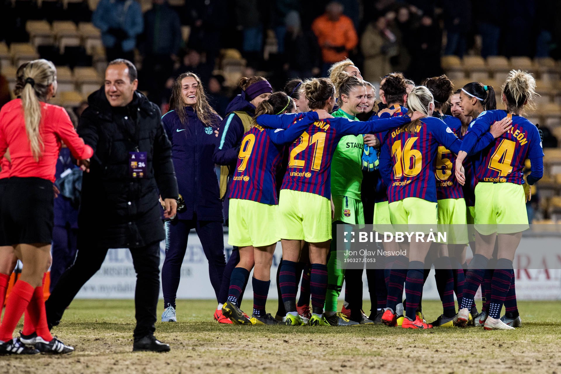 Lluis Cortes, coach, and the players of Barcelona celebrate
