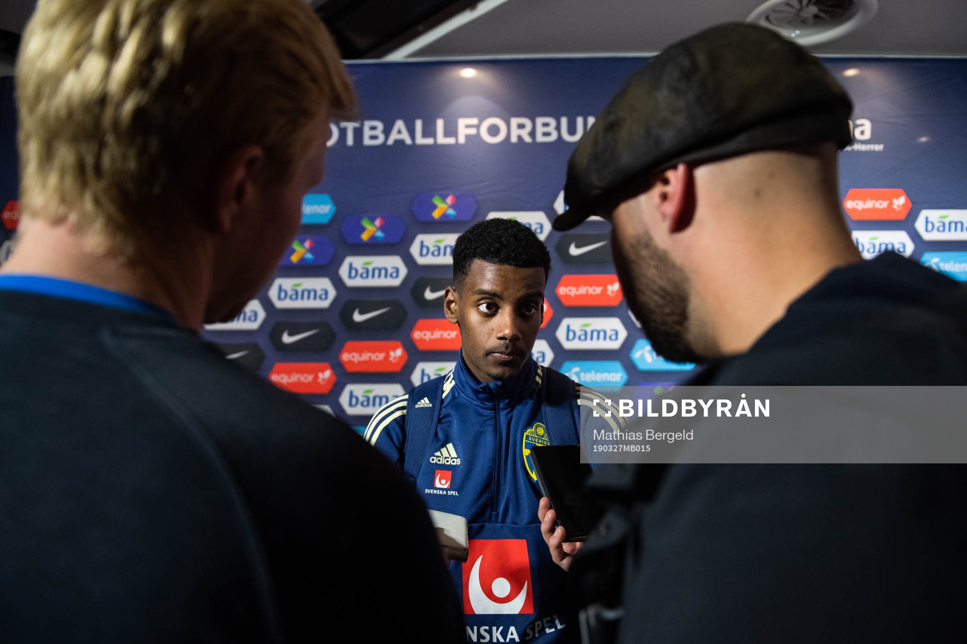 Alexander Isak of Sweden talks to the media