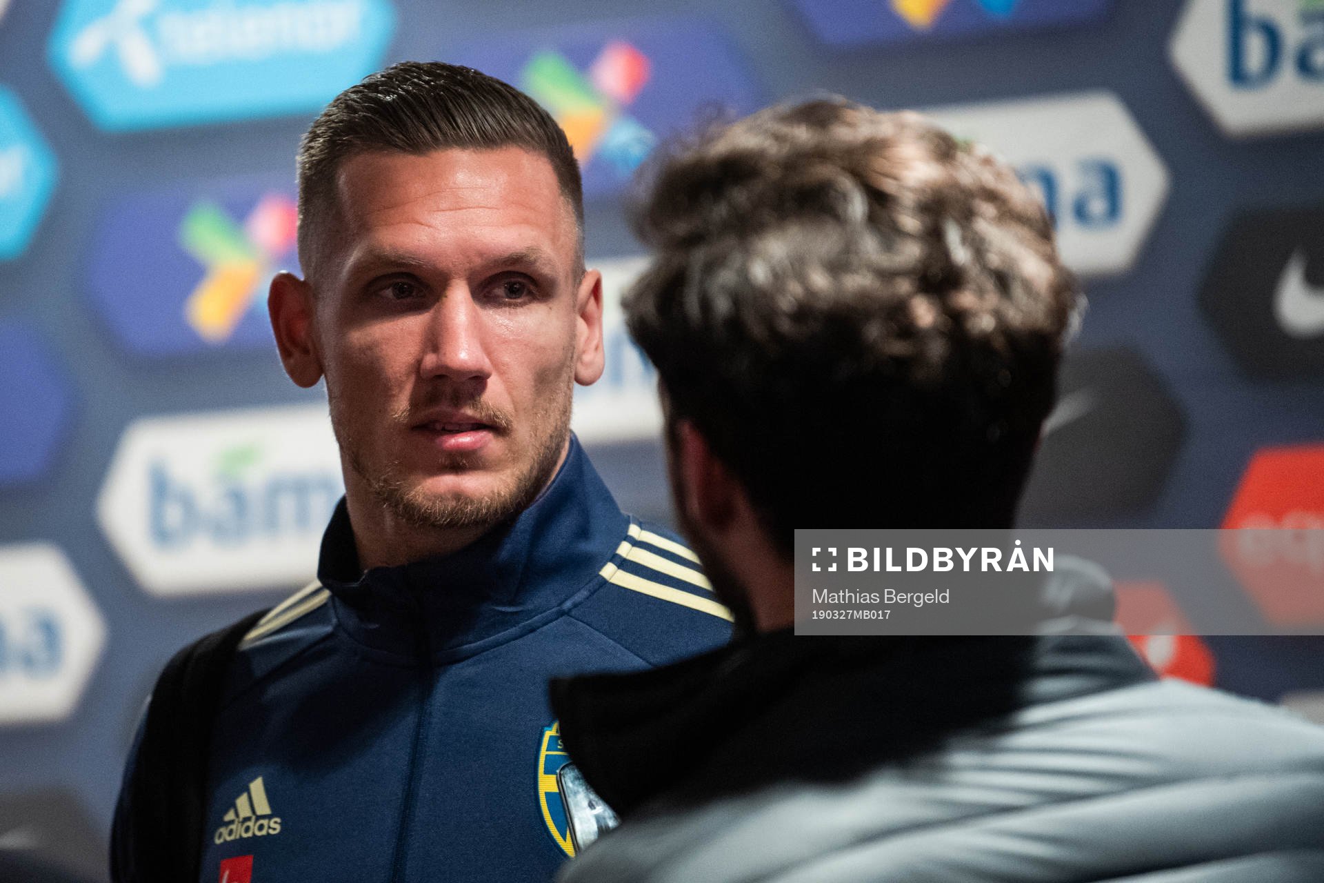 goalkeeper Robin Olsen of Sweden talks to the media in the mixed zone after the UEFA Euro qualifier football match between Norway and Sweden on March 26, 2019 in Oslo.