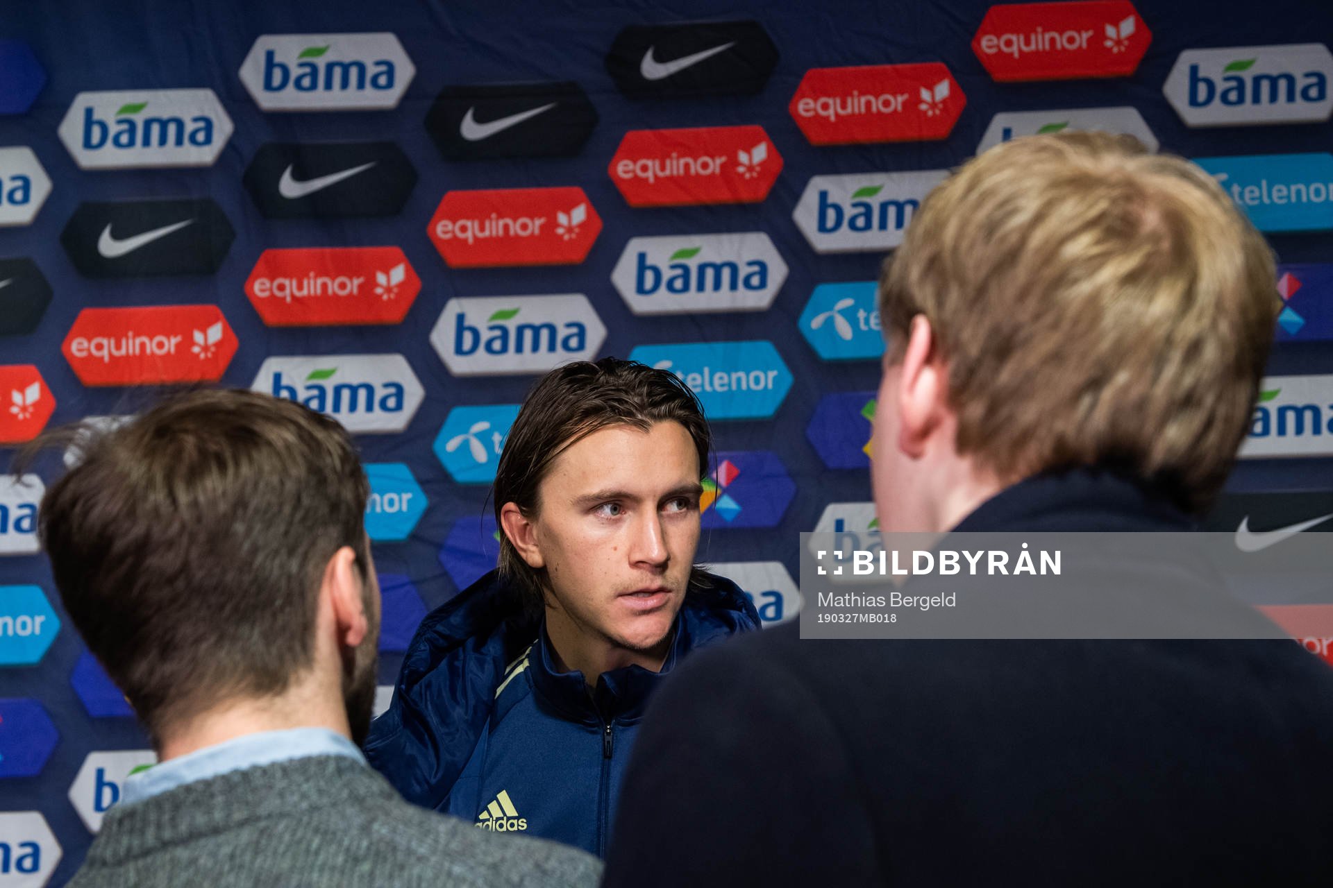 Kristoffer Olsson of Sweden talks to the media