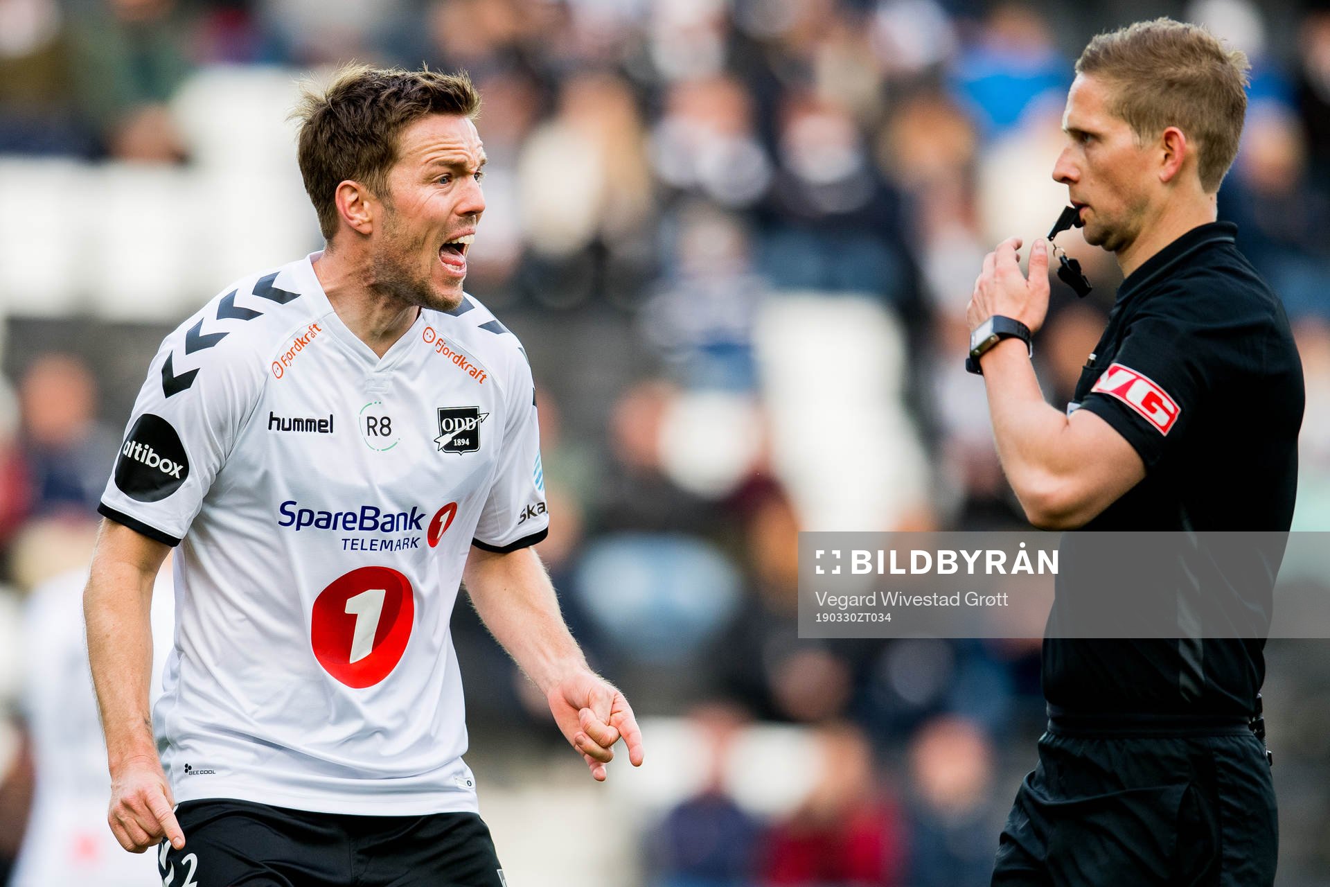 Espen Ruud of Odd argues with referee Espen Andreas Eskås