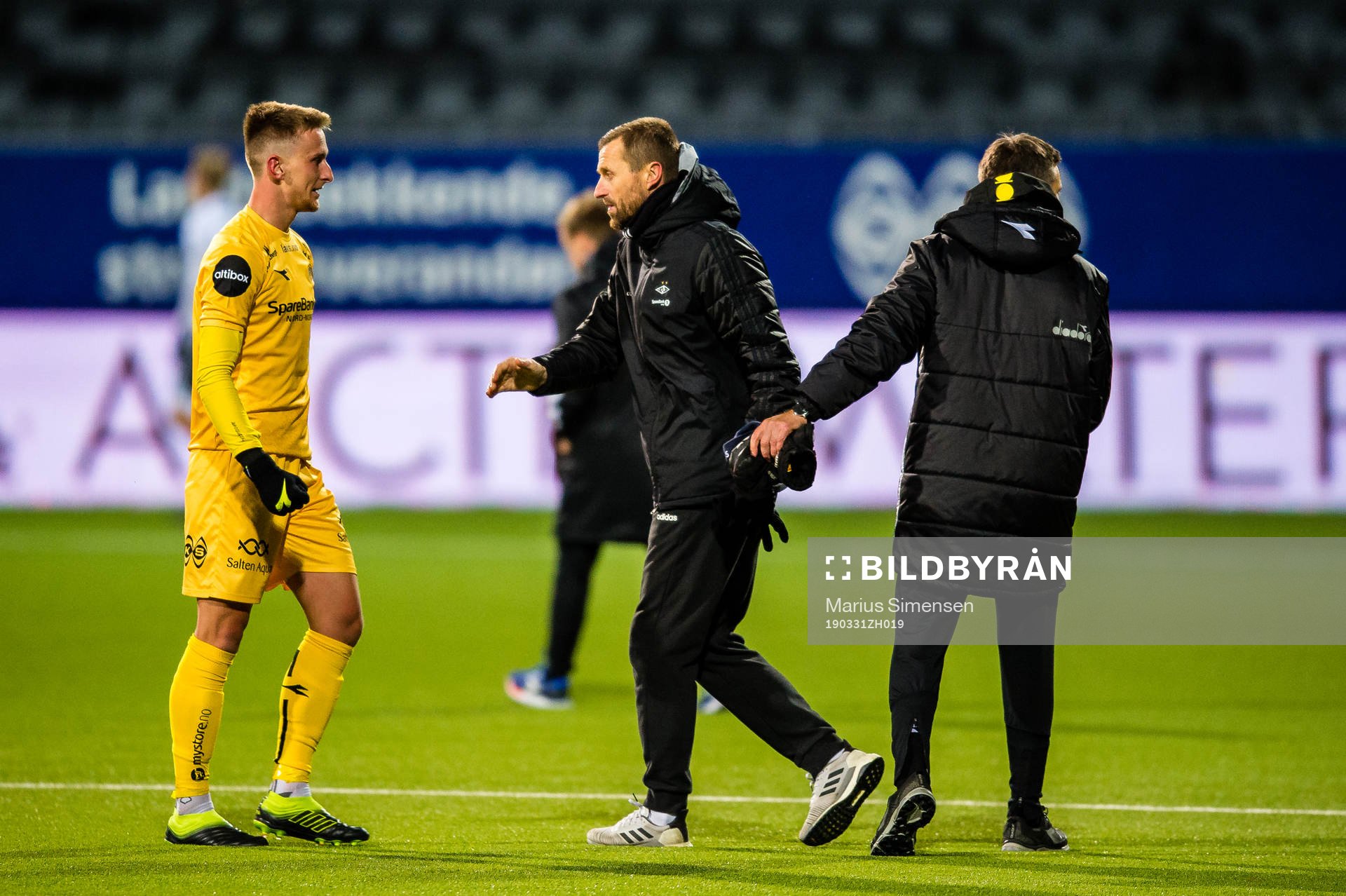 Erlend Dahl Reitan of Bodø/Glimt, Eirik Horneland, head coach of Rosenborg, and Kjetil Knutsen, head coach of Bodø/Glimt, after the Eliteserien match between Bodø/Glimt and Rosenborg on March 31, 2019 in Bodø.
