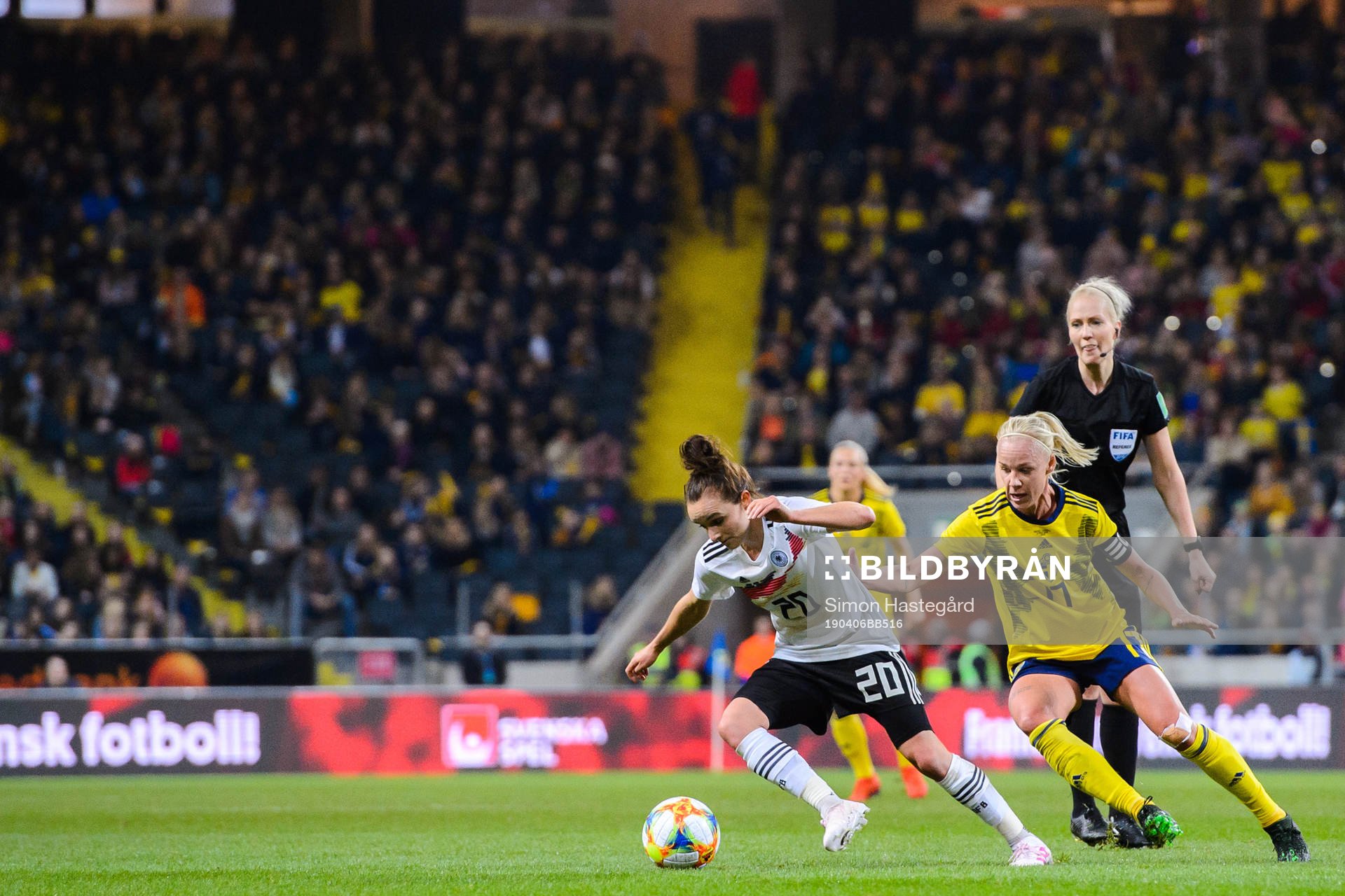 Lina Magull of Germany and Caroline Seger of Sweden