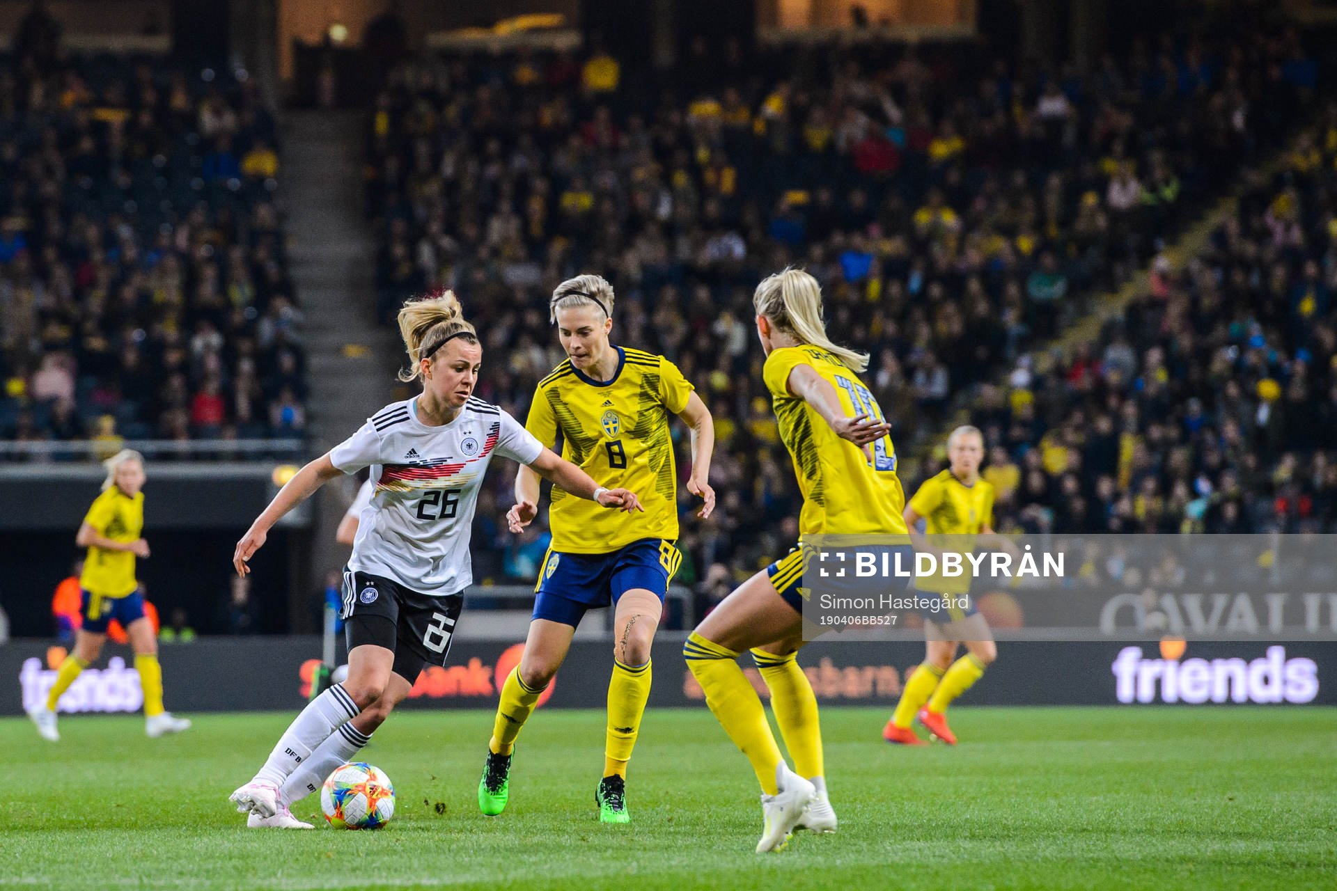 Lena Lattwein of Germany against Lina Hurtig and Sofia Jakobsson of Sweden during the women’s international friendly football match between Sweden and Germany on April 6, 2019 in Stockholm.