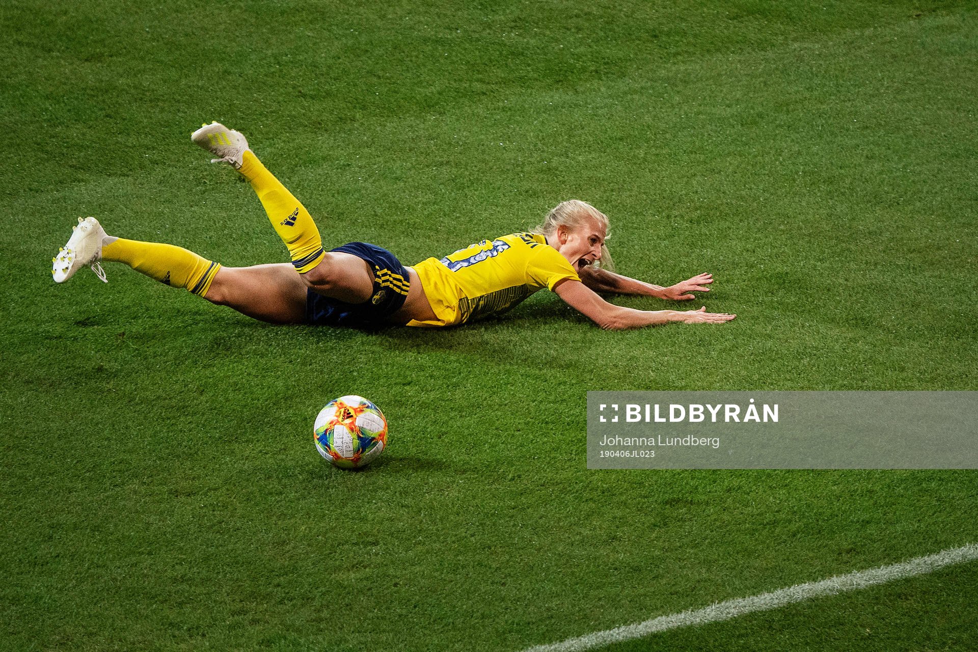 Sofia Jakobsson of Sweden falls in the penalty area