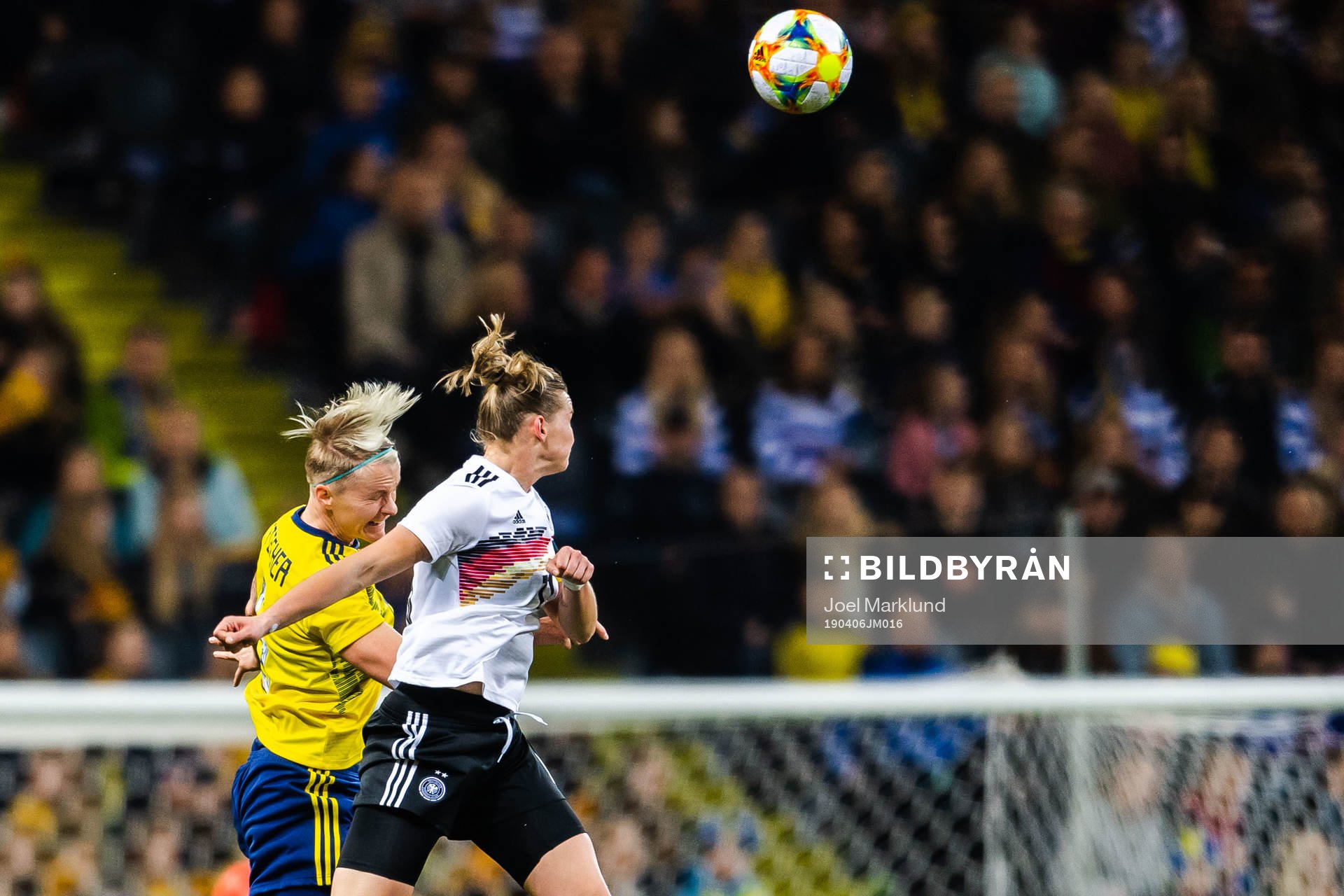 Nilla Fischer of Sweden and Alexandra Popp of Germany