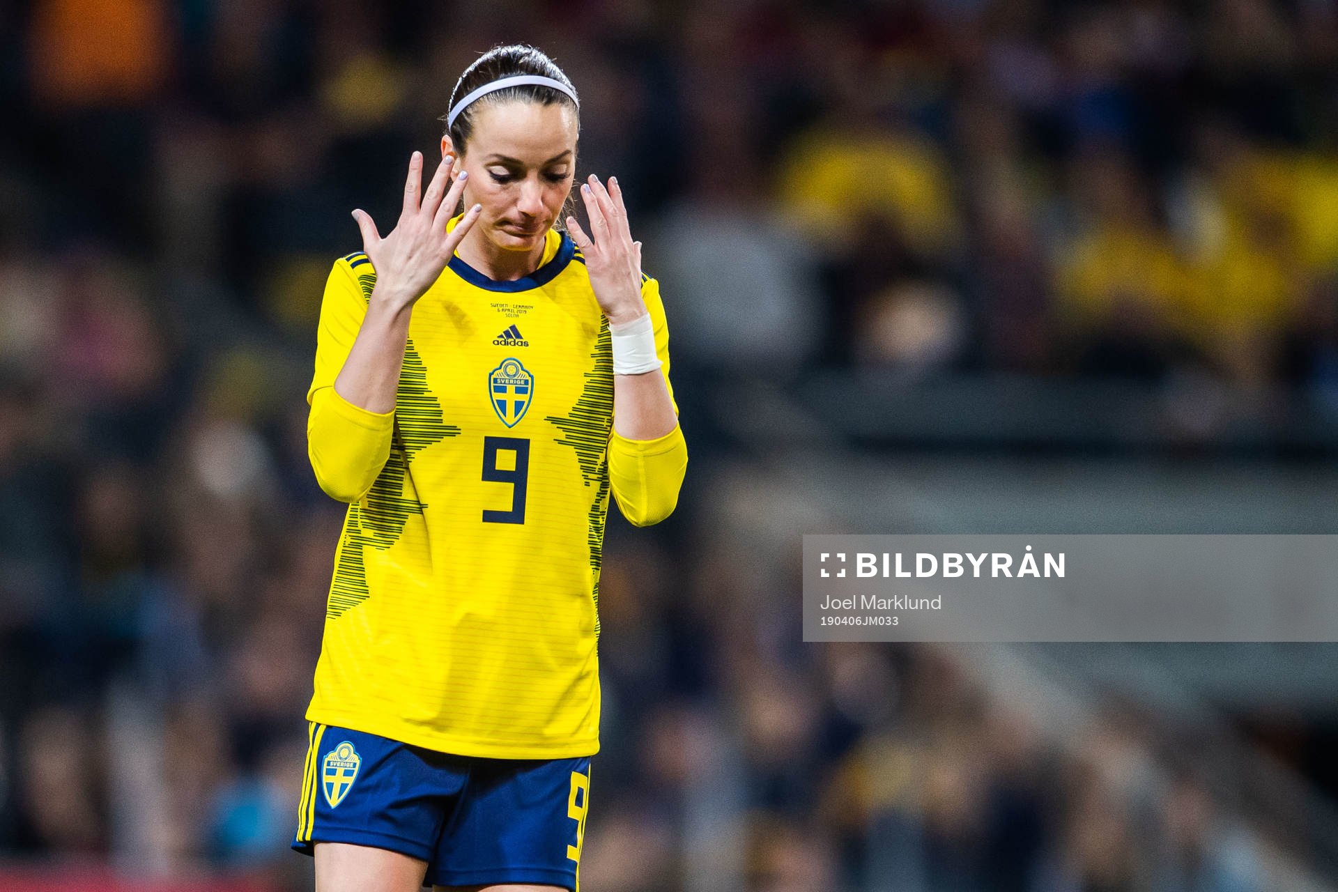 Kosovare Asllani of Sweden looks dejected