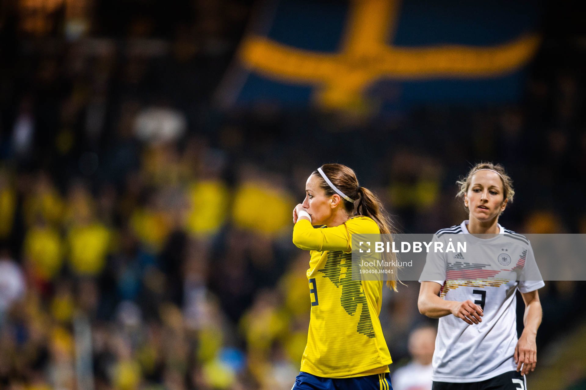 Kosovare Asllani of Sweden and Kathrin Hendrich of Germany