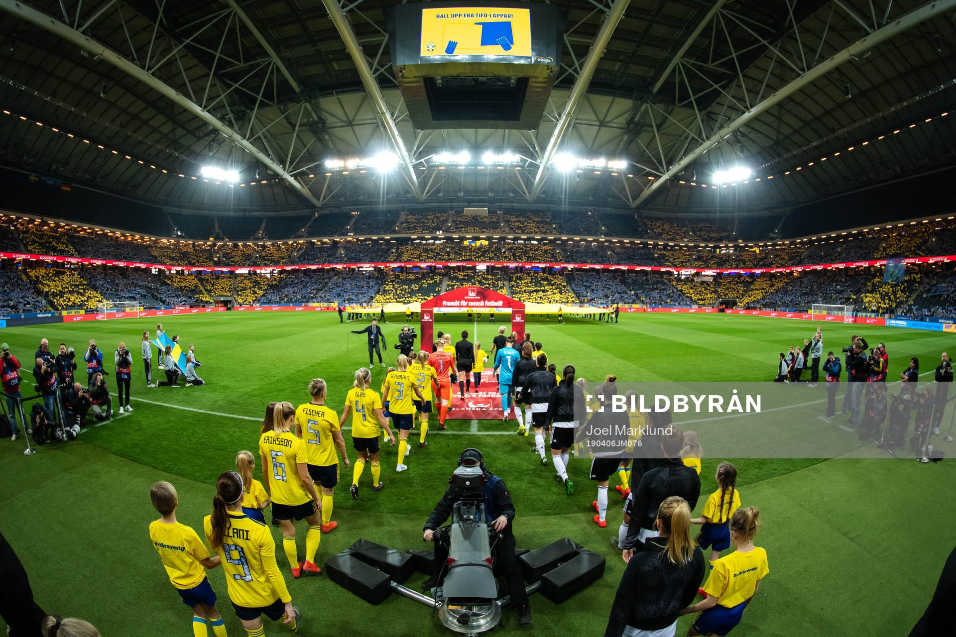 The players of Sweden and Germany enter the field