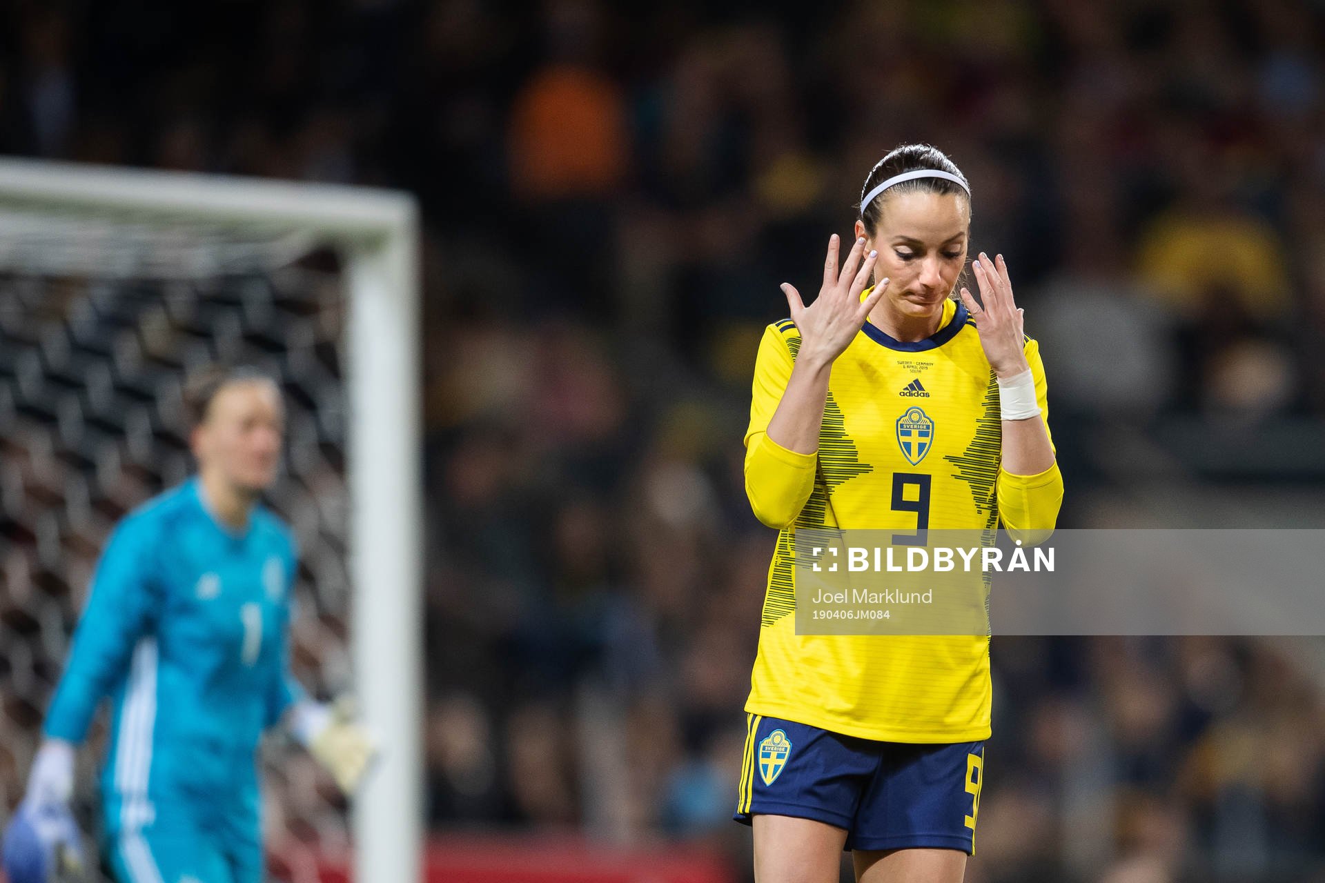 Kosovare Asllani of Sweden looks dejected