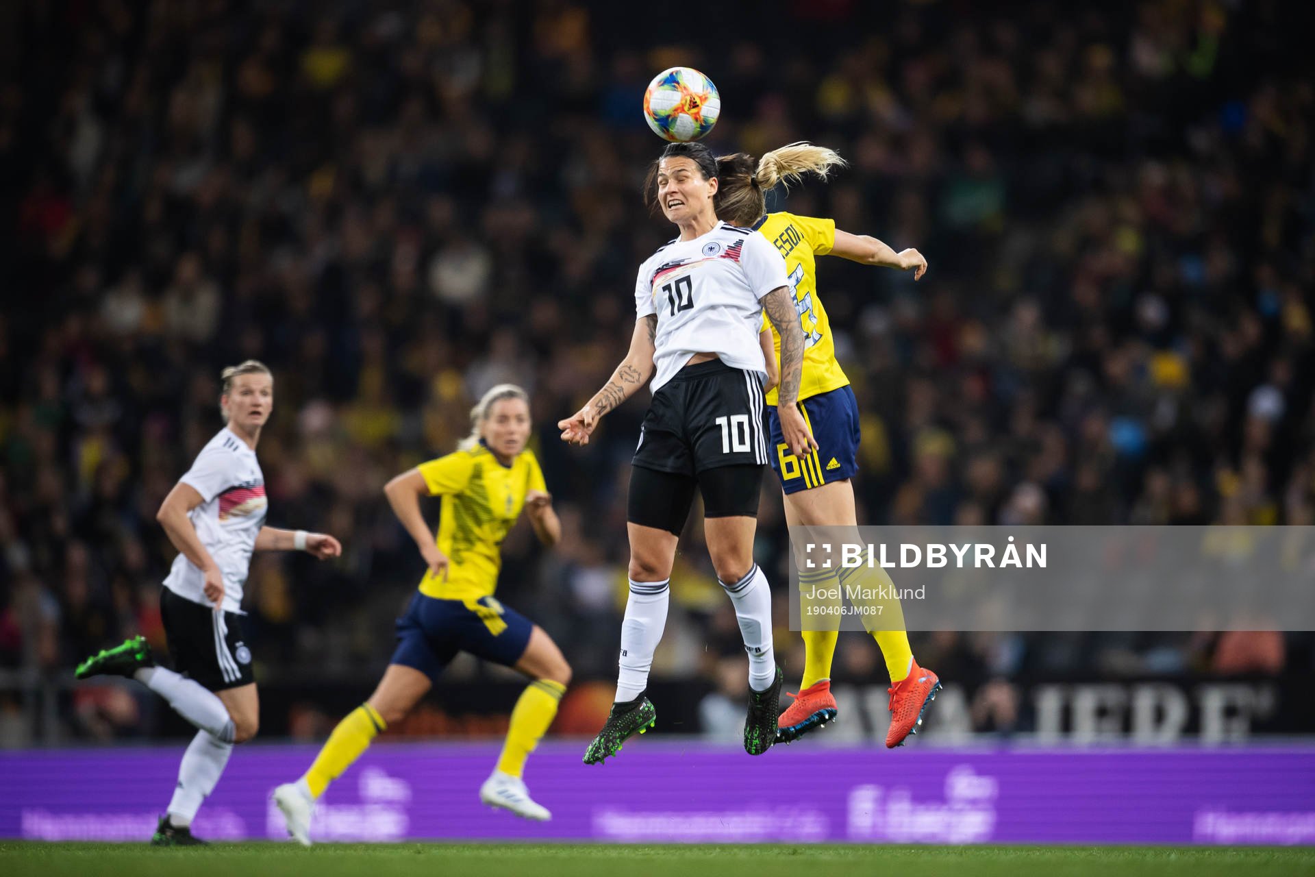 Dzsenifer Marozsan of Germany and Magdalena Eriksson of