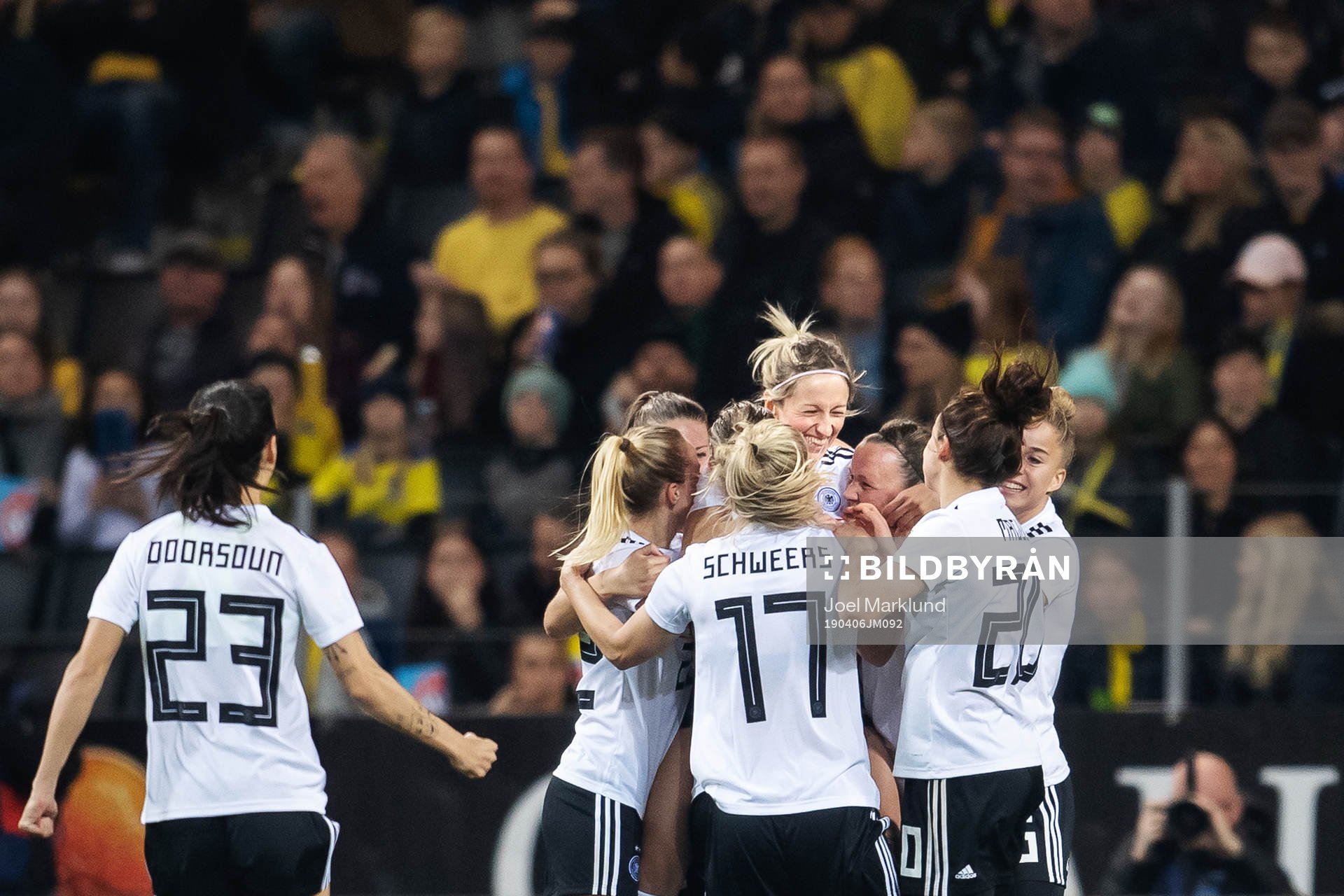 Kathrin Hendrich of Germany celebrates with teammates