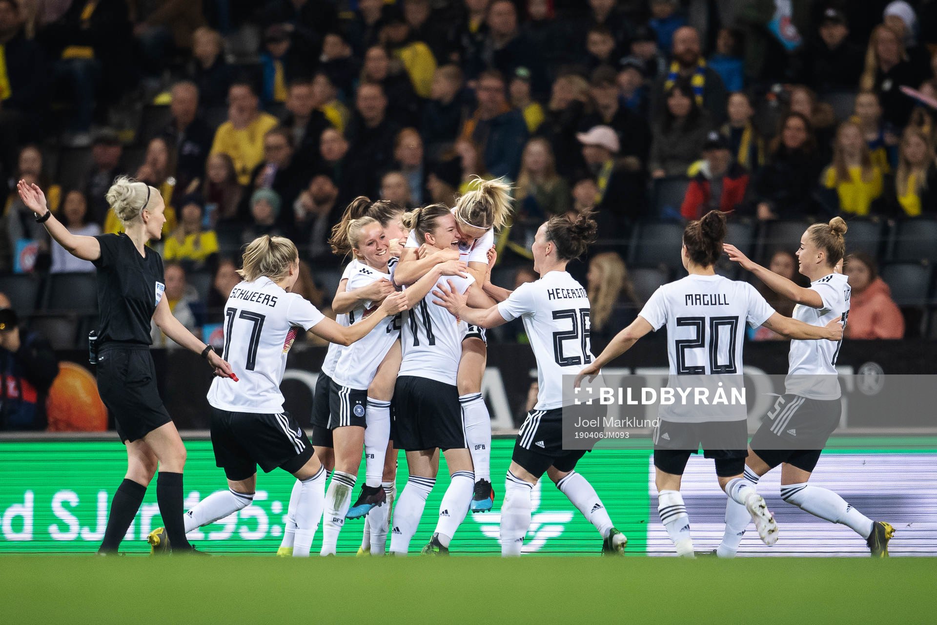 Kathrin Hendrich of Germany celebrates with teammates