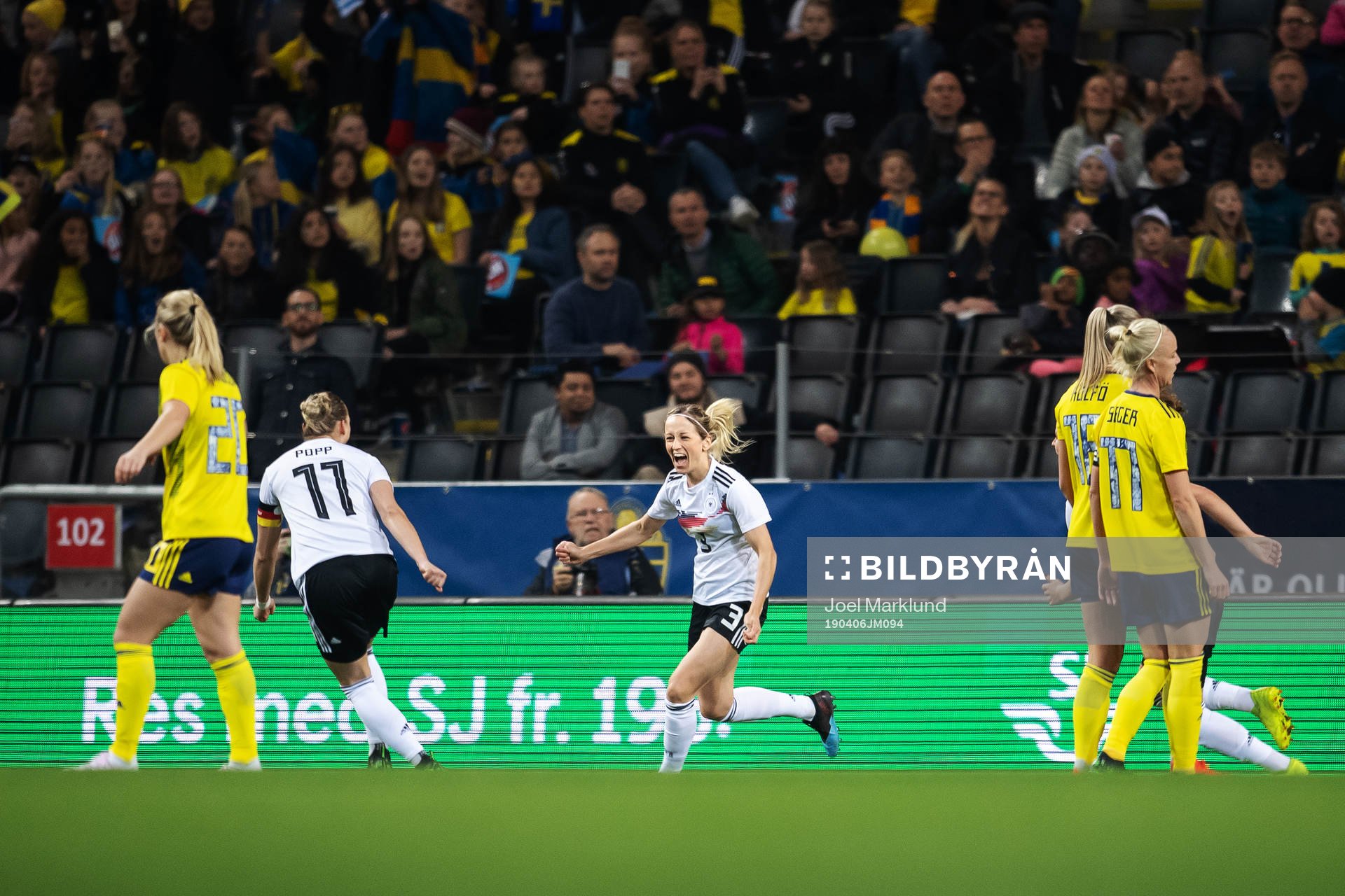 Alexandra Popp and Kathrin Hendrich of Germany celebrate