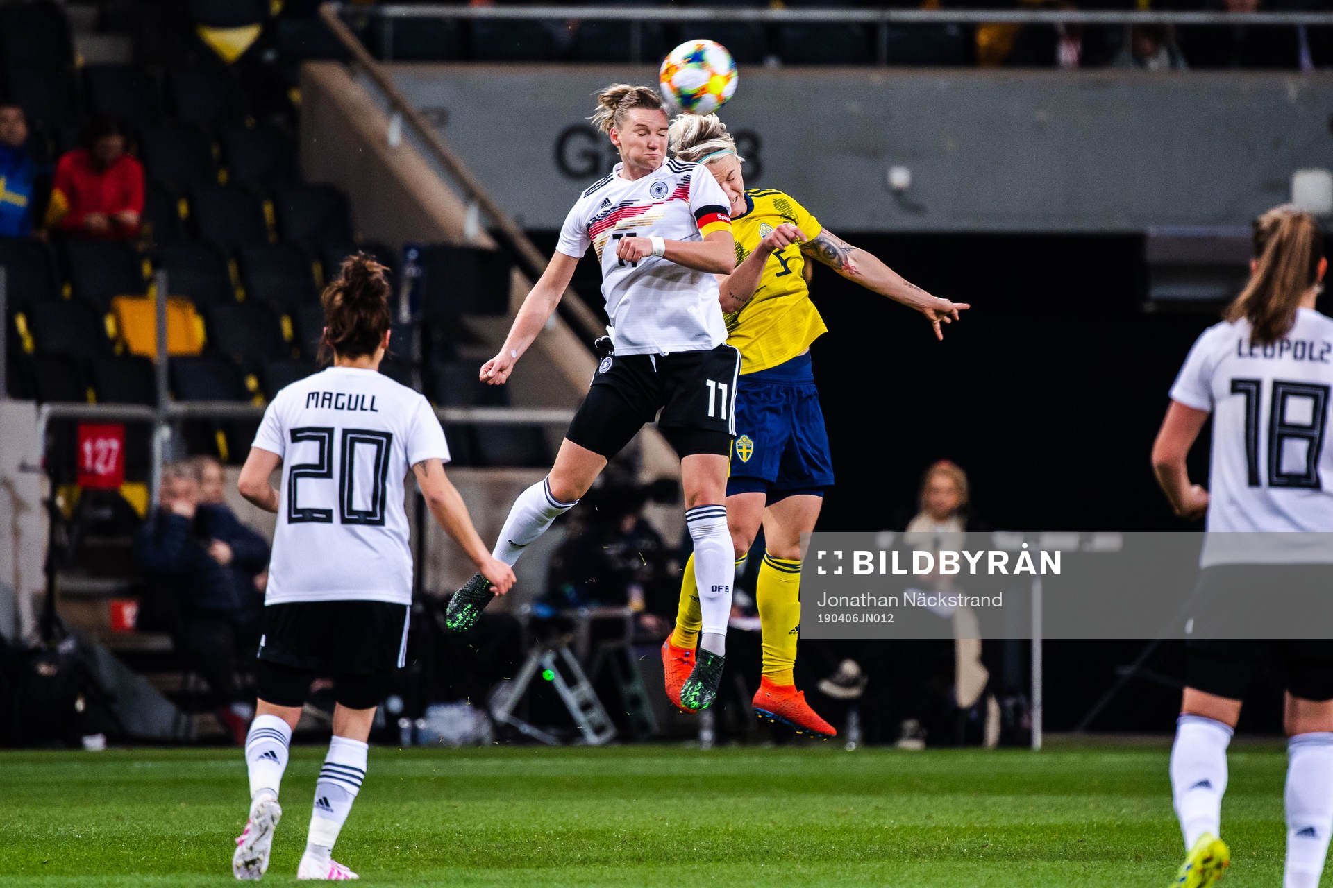 Alexandra Popp of Germany and Nilla Fischer of Sweden