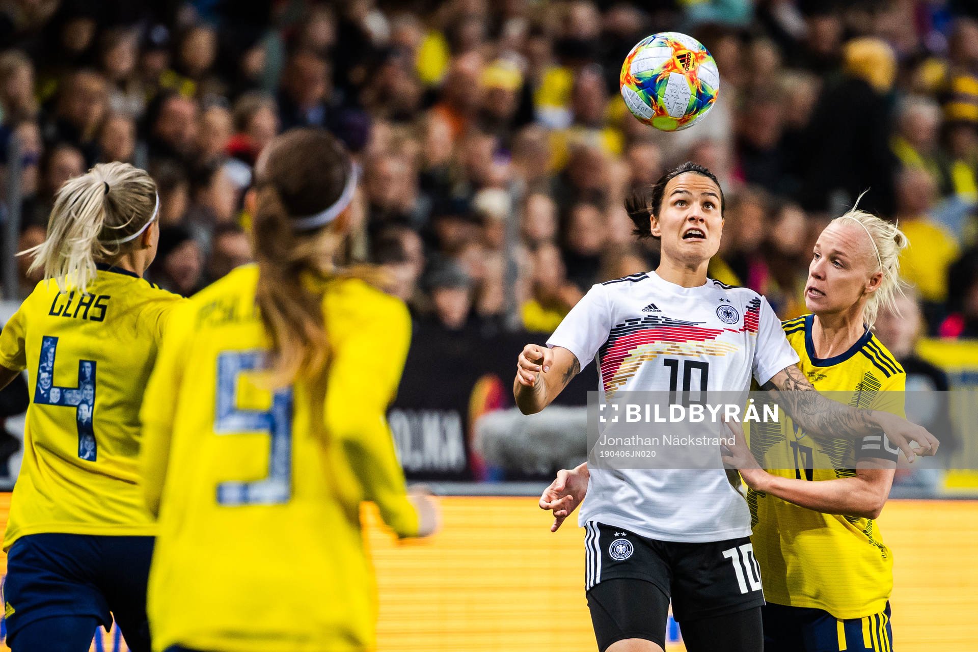 Dzsenifer Marozsan of Germany and Caroline Seger of Sweden