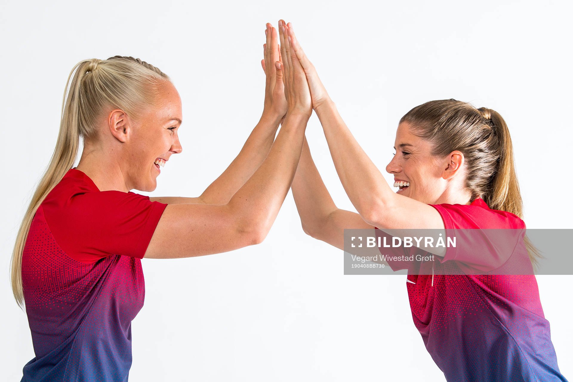 Maria Thorisdottir and Maren Mjelde of Norway pose for a