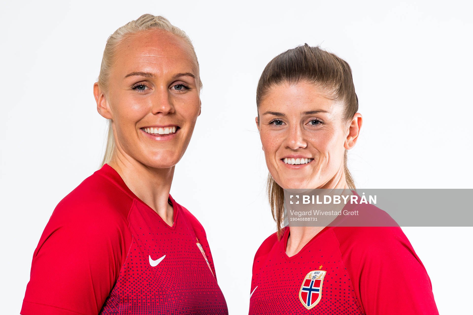 Maria Thorisdottir and Maren Mjelde of Norway pose for a