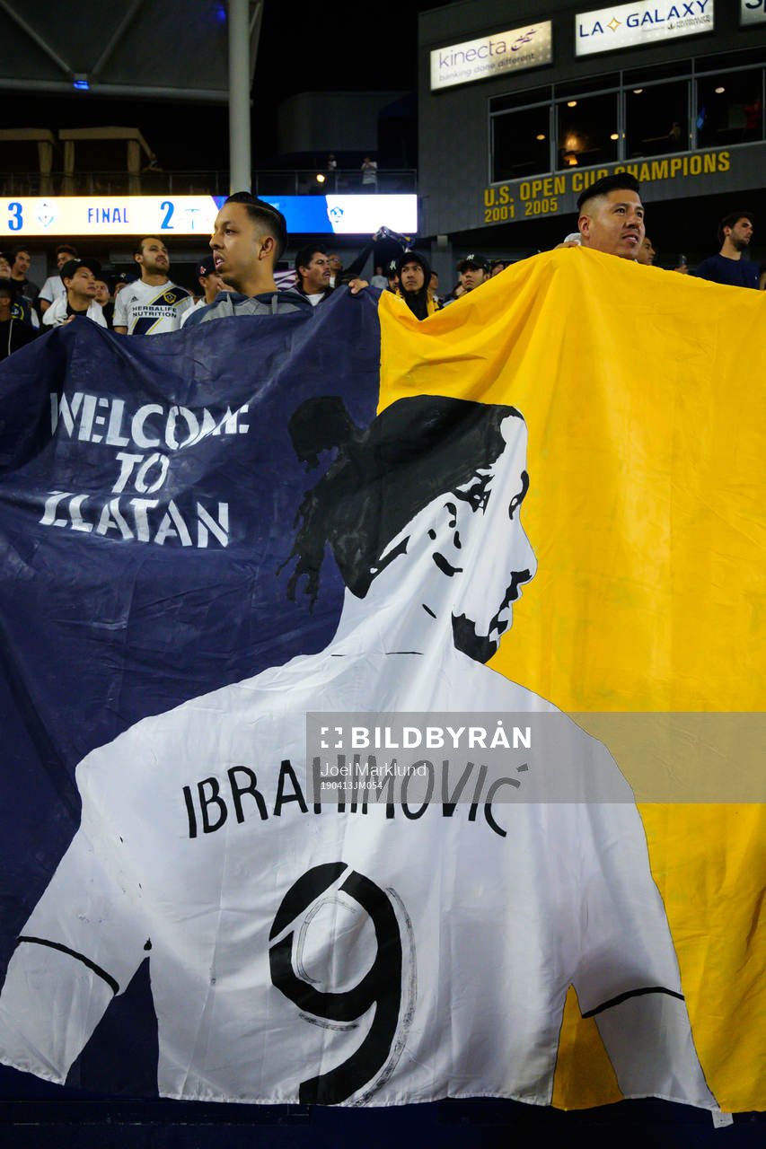 Fans hold a banner of Zlatan Ibrahimovic of LA Galaxy