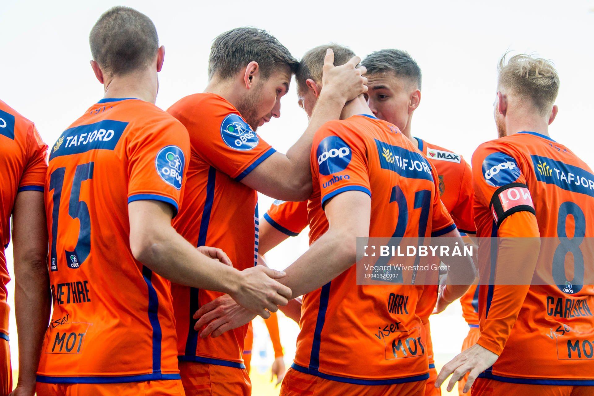 Peter Orry Larsen of Aalesund celebrates with teammate