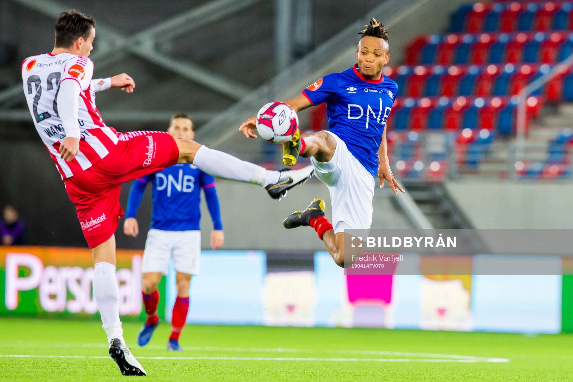 Simen Wangberg of Tromsø and Chidera Ejuke of Vålerenga