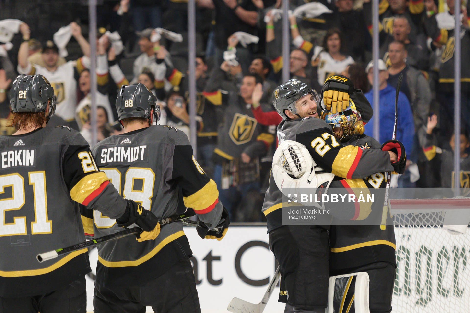 Shea Theodore hugs Marc-Andre Fleury of Vegas Golden Knights
