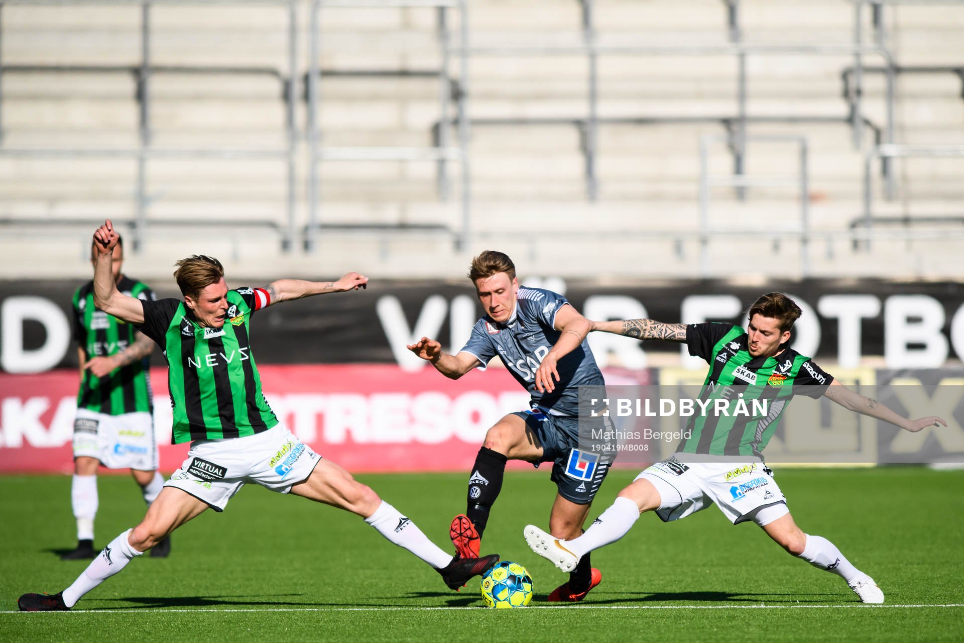 GAIS Marcus Bergholtz och Andreas Östling i kamp med Brages Bjarni Mark Antonsson under fotbollsmatchen i Superettan mellan Gais och Brage den 19 april 2019 i Göteborg.