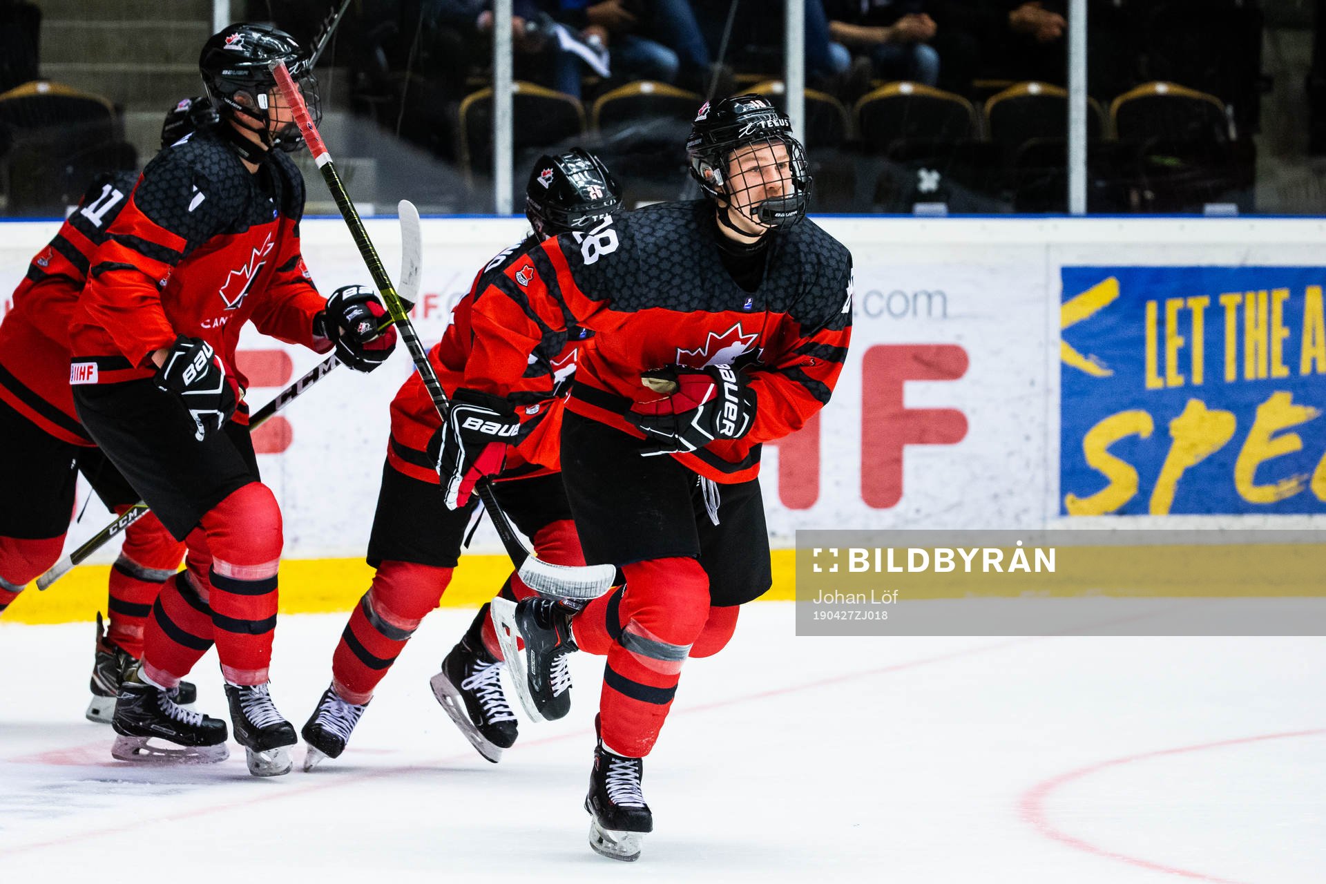 Connor Zary of Canada celebrates