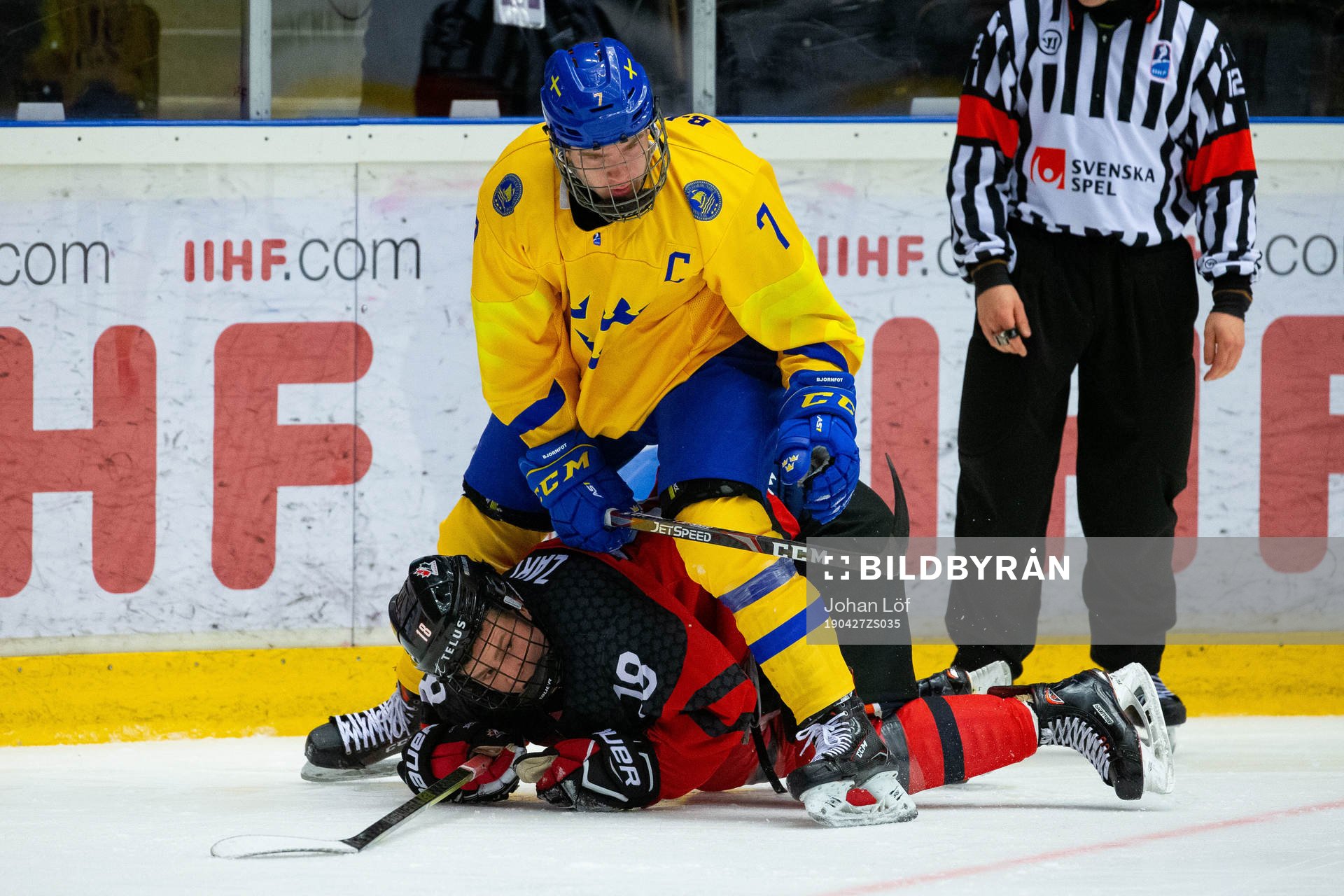 Tobias Björnfot of Sweden and Connor Zary of Canada of