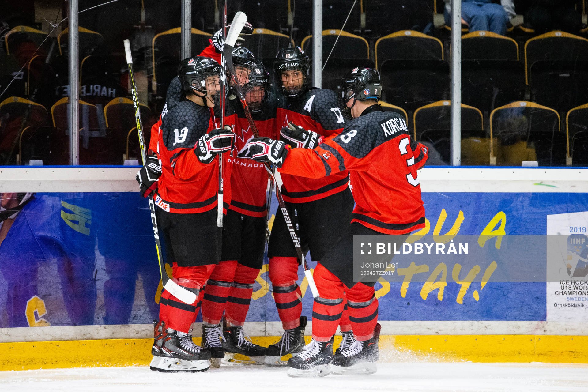 Alex Newhook of Canada celebrate with team mates