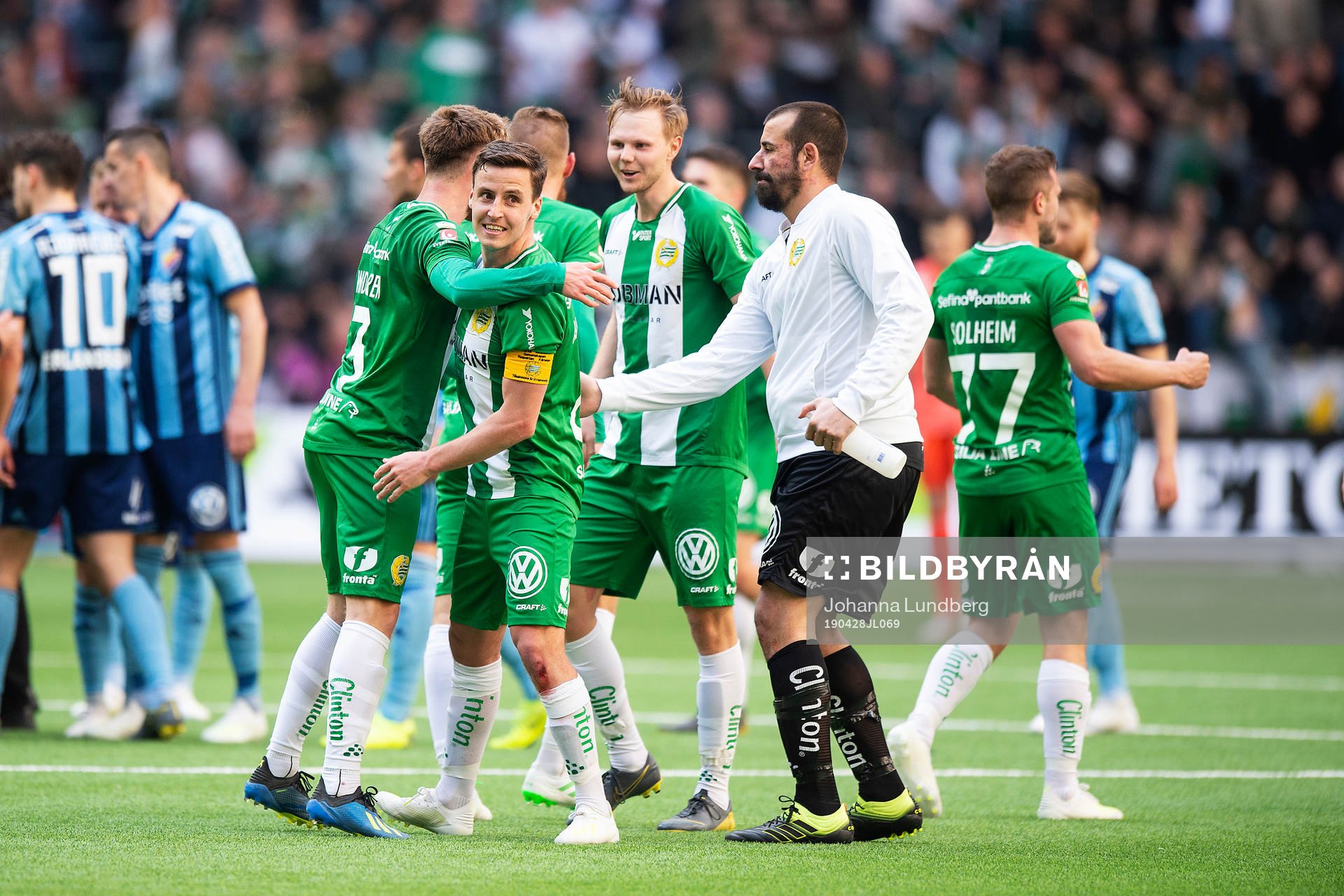 Hammarbys Jeppe Andersen, Tim Söderström och målvakt Gianluca Curci jublar efter fotbollsmatchen i Allsvenskan mellan Hammarby och Djurgården den 87 april 2019 i Stockholm.