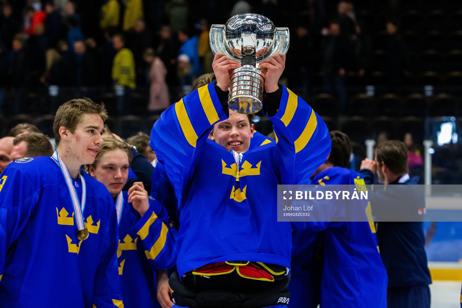 Players of Sweden celebrates with the trophy