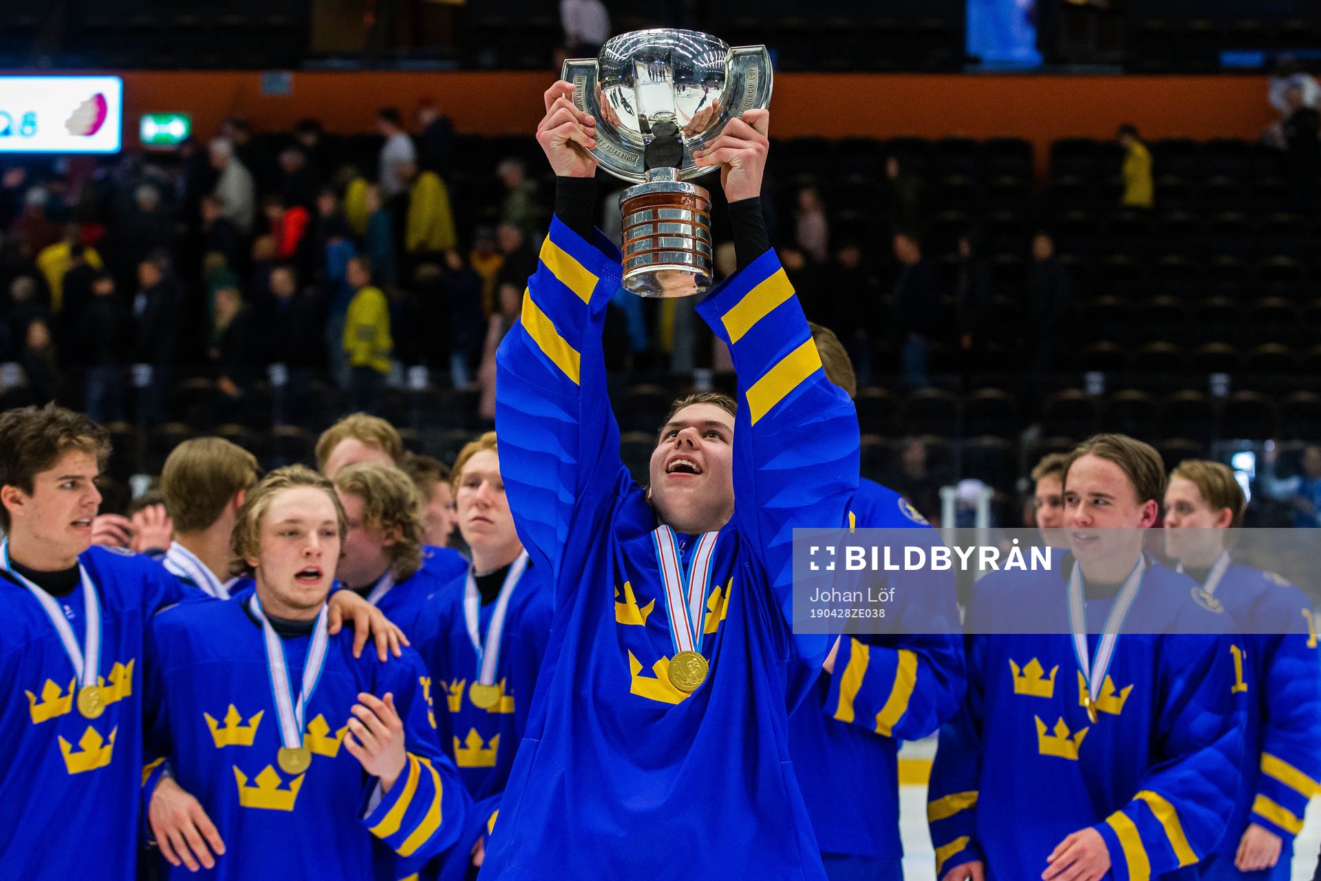 Players of Sweden celebrates with the trophy