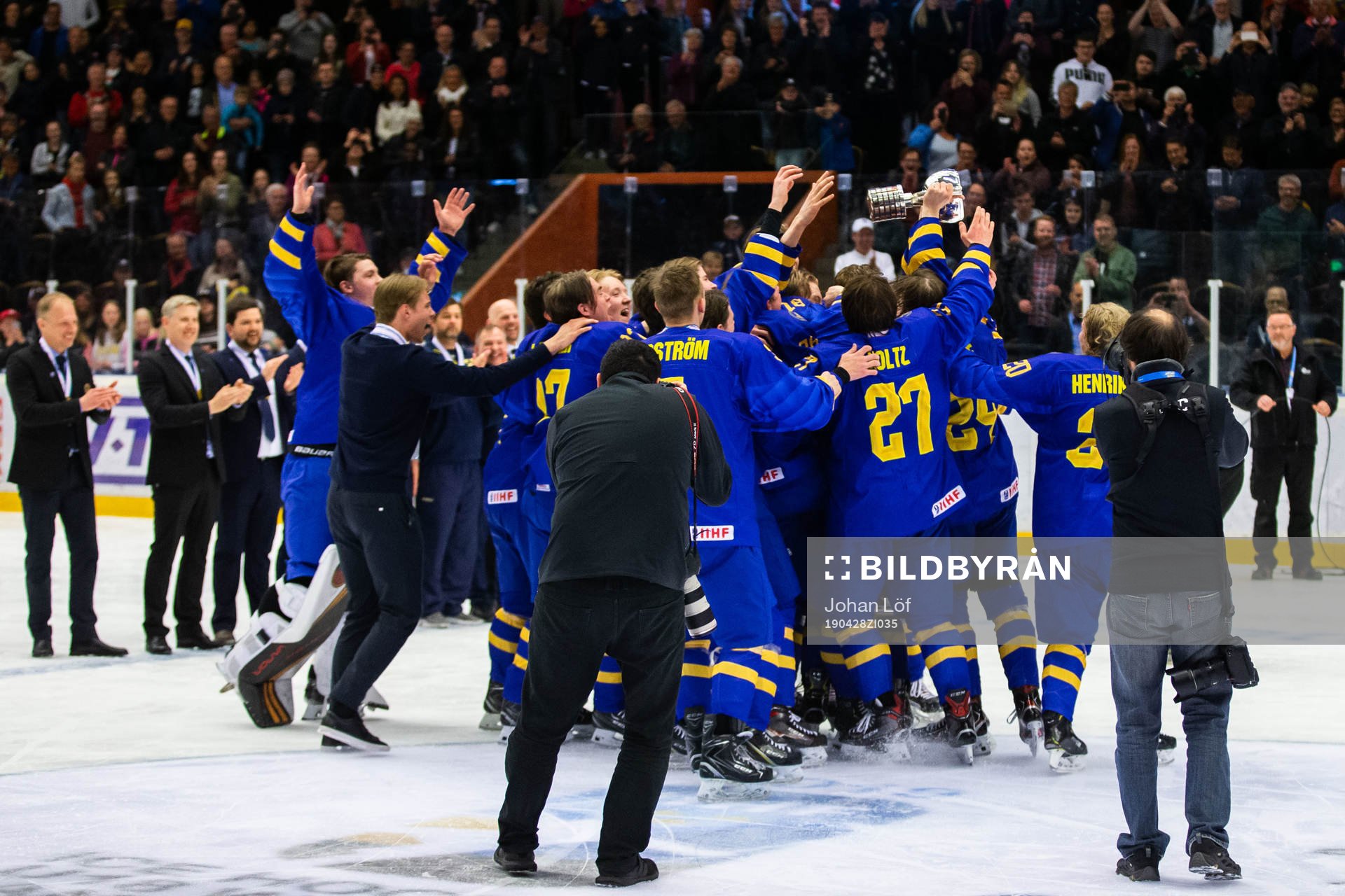 Players of Sweden celebrates with the trophy