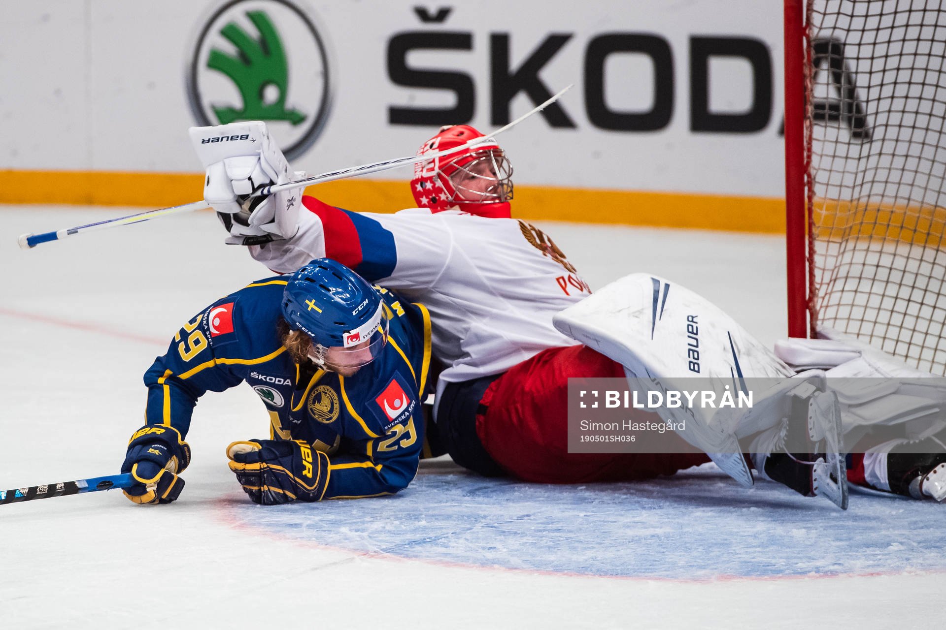 Mario Kempe of Sweden and goalkeeper Andrei Vasilevsky of