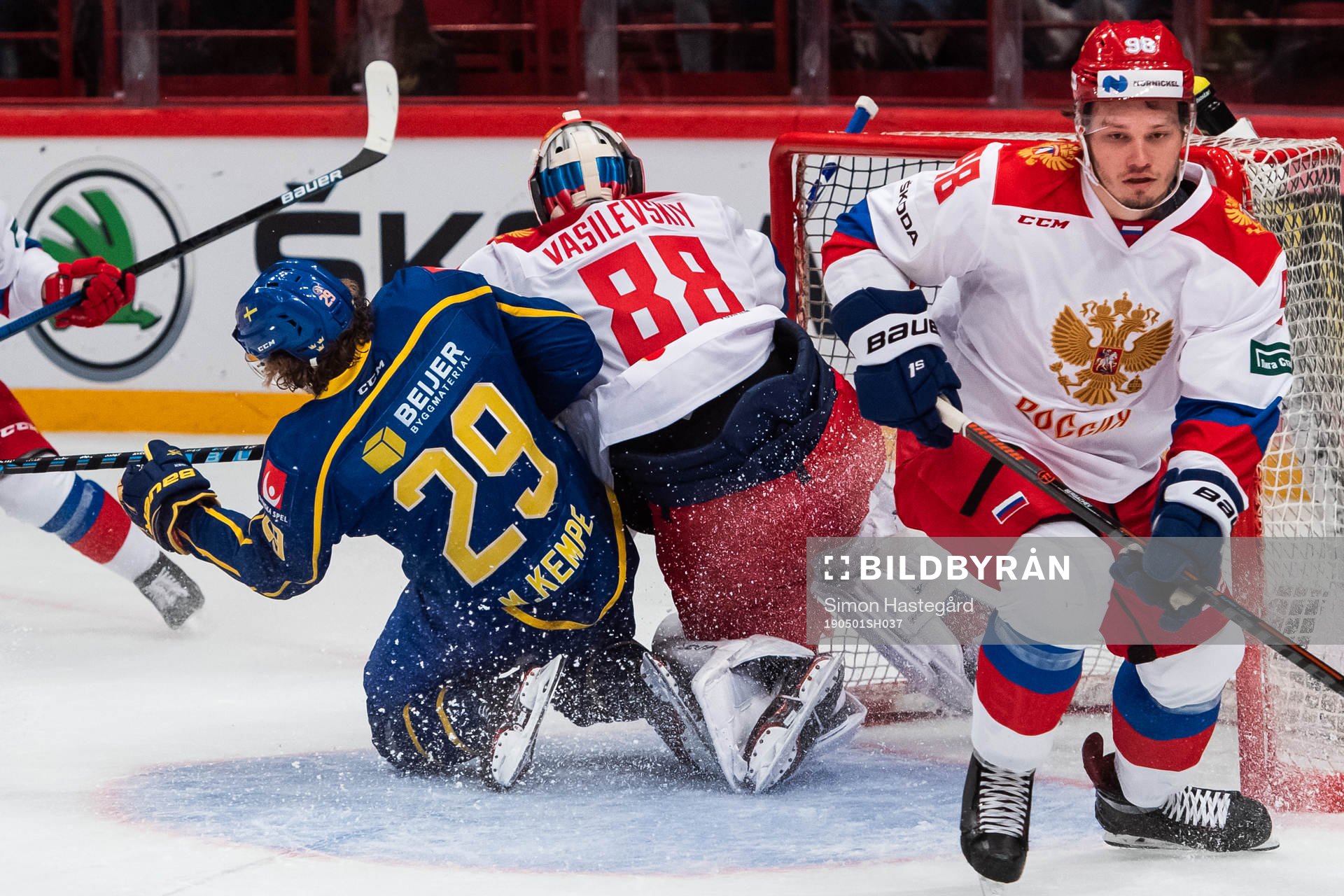 Mario Kempe of Sweden and goalkeeper Andrei Vasilevsky of
