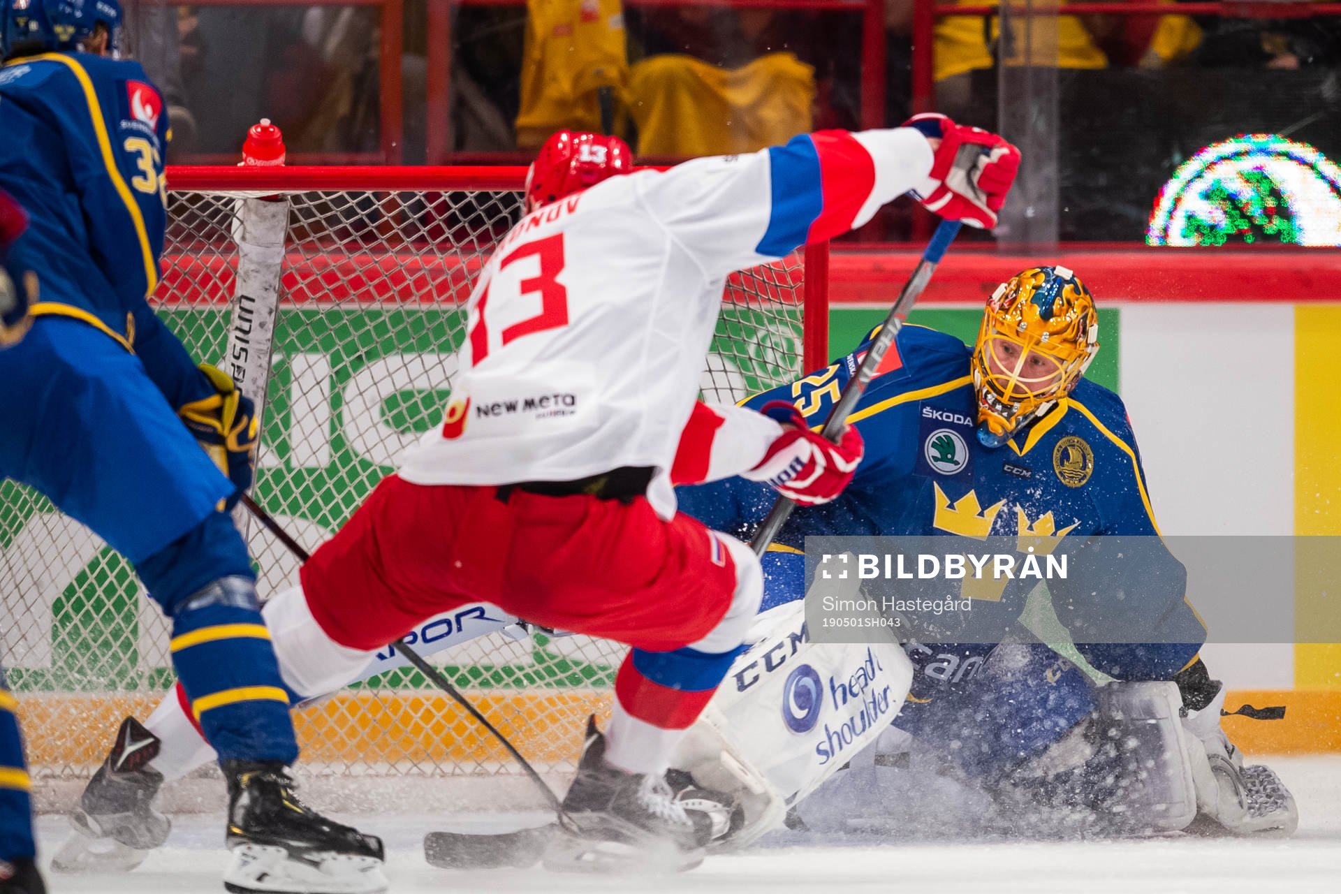 Sergei Andronov of Russia scores 3-2 behind goaltenderJacob