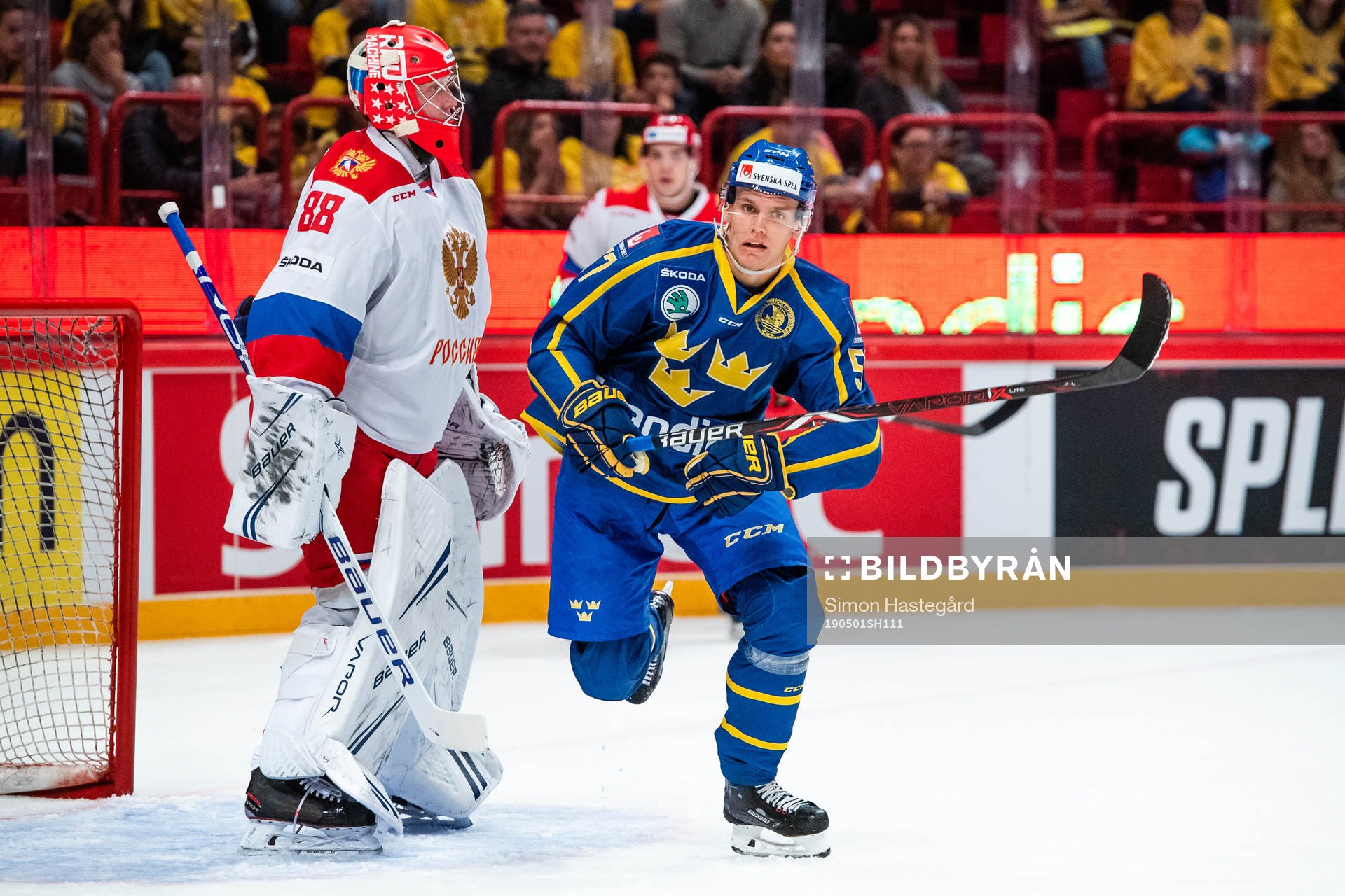 gGalkeeper Andrei Vasilevsky of Russia and Anton Wedin of