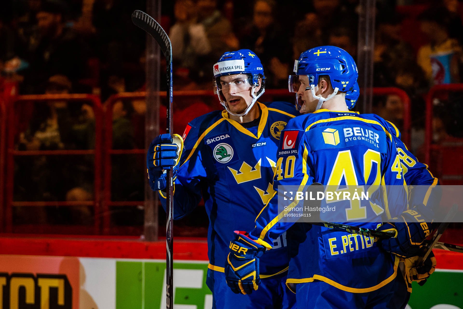 Loui Eriksson celebrate with Elias Pettersson of Sweden